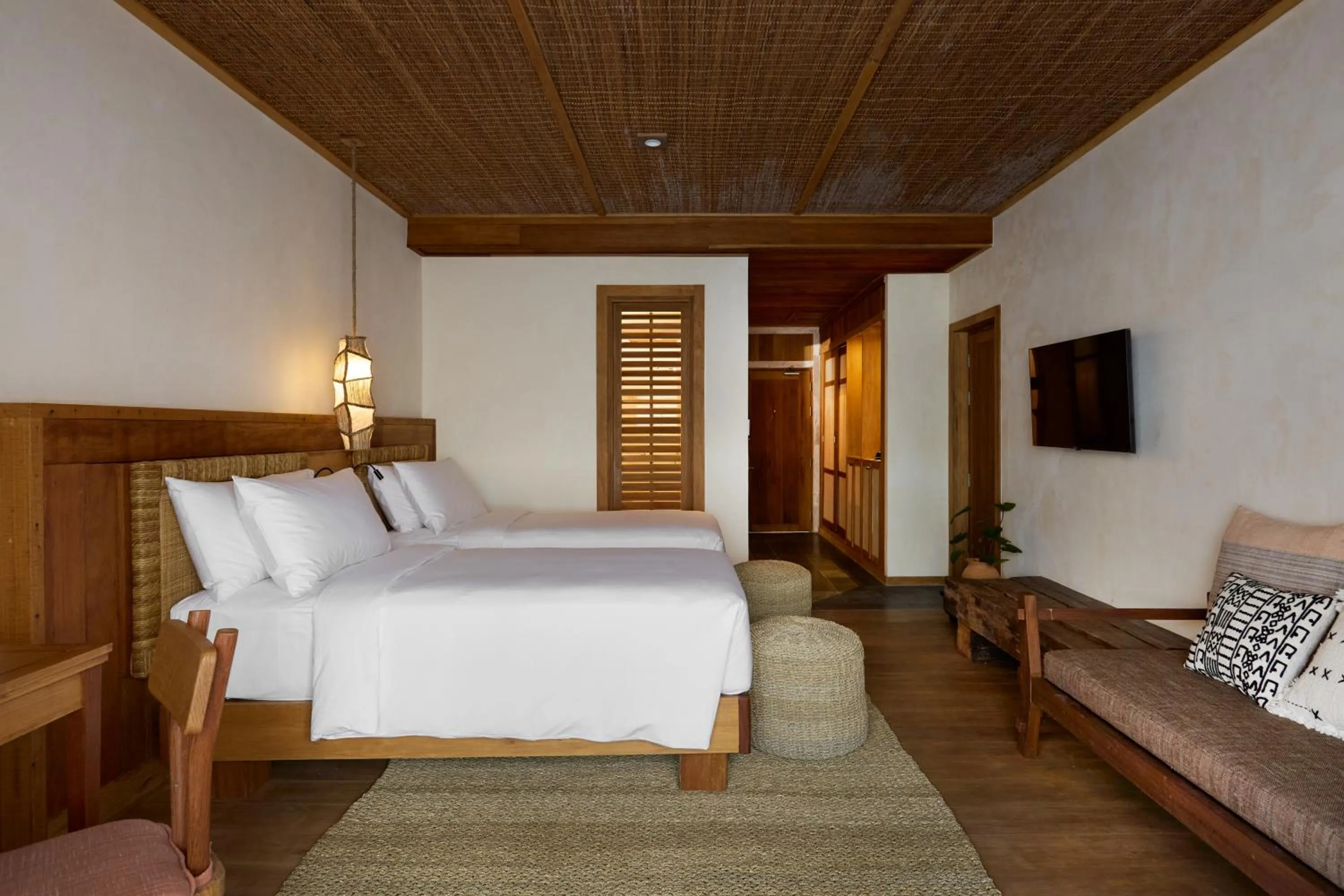 Bed in Vignette Collection Dinso Resort & Villas Ko Chang by IHG