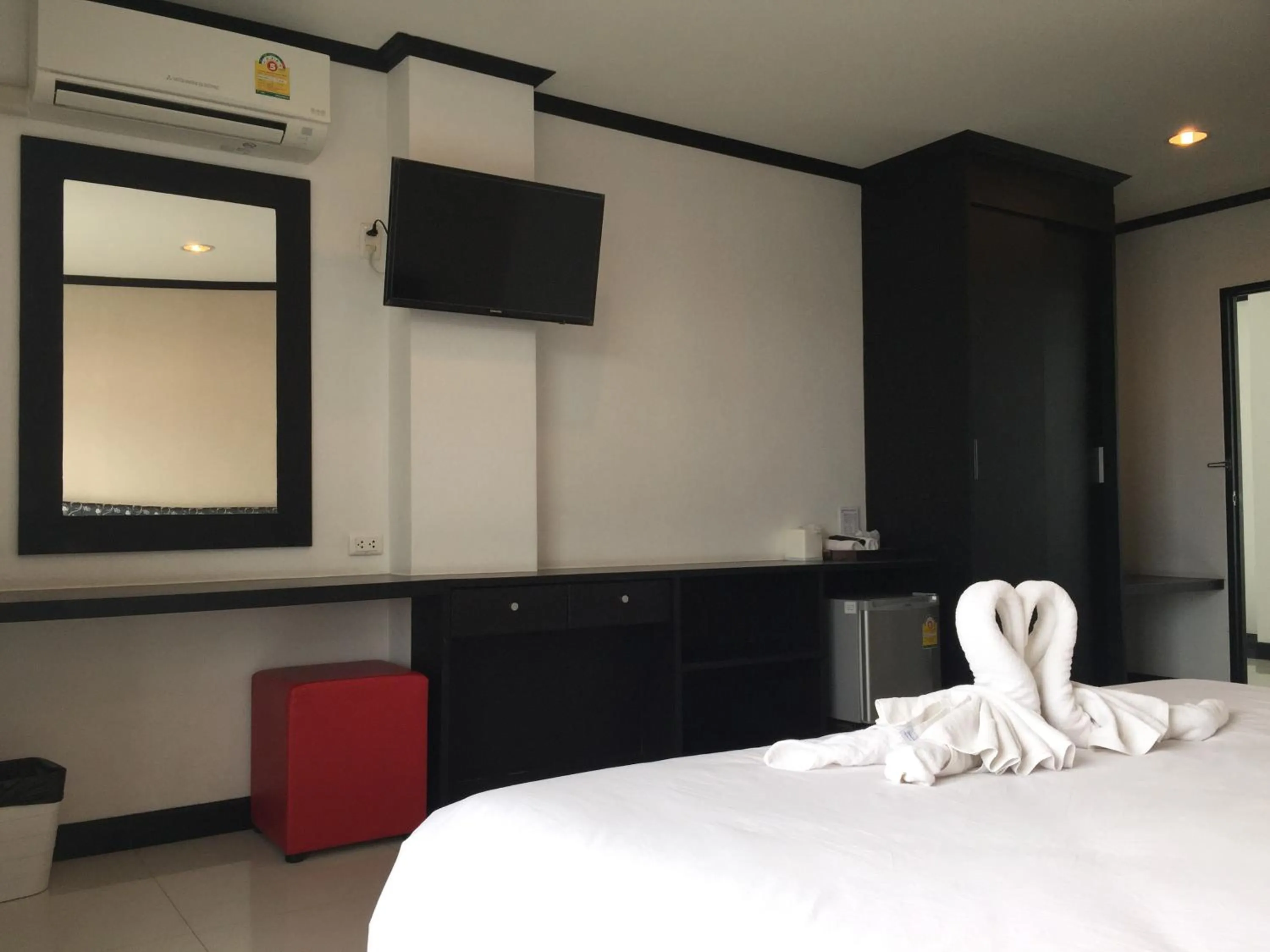 Bed in Leelawadee Grand Hotel