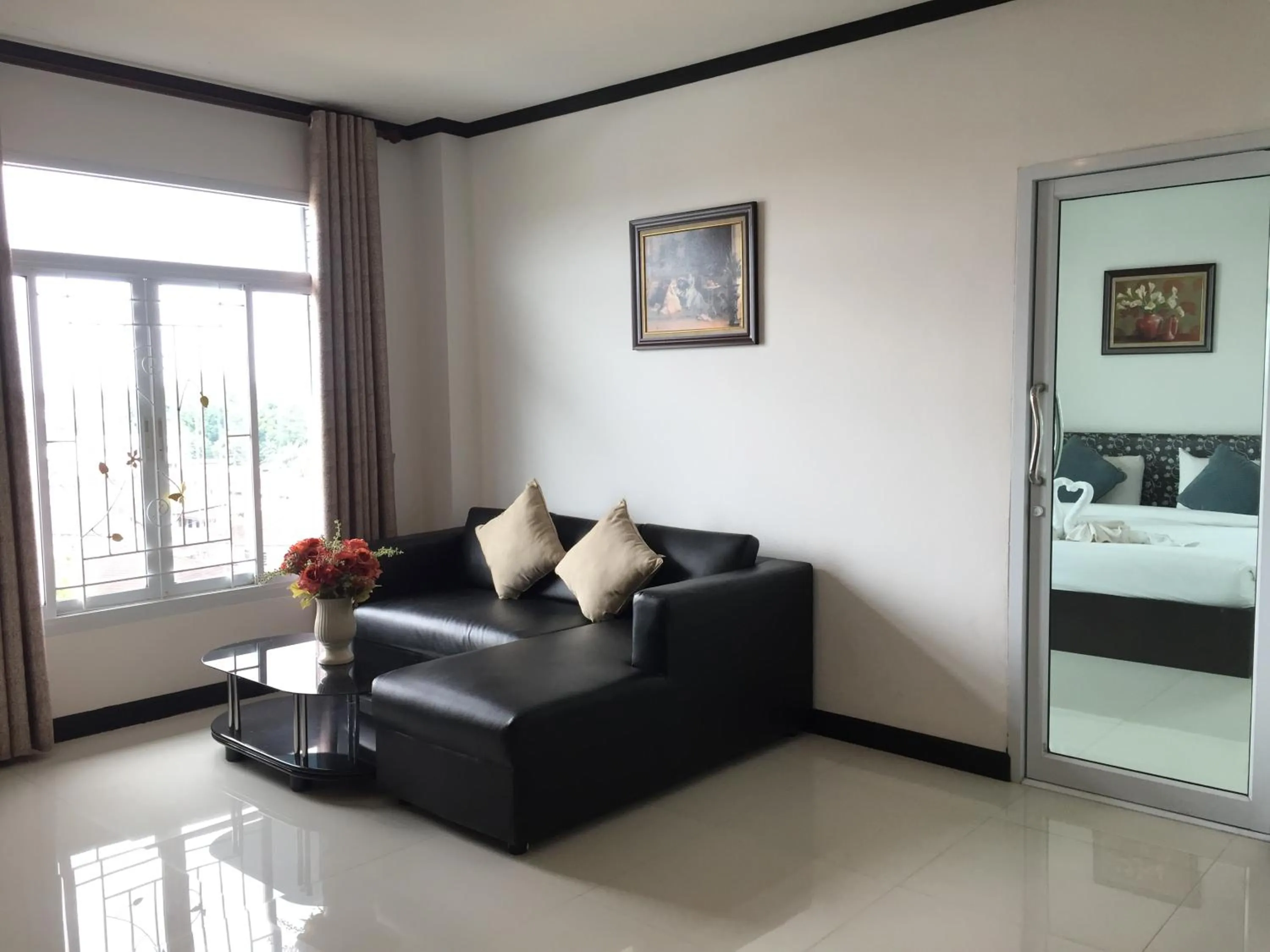 Bed in Leelawadee Grand Hotel