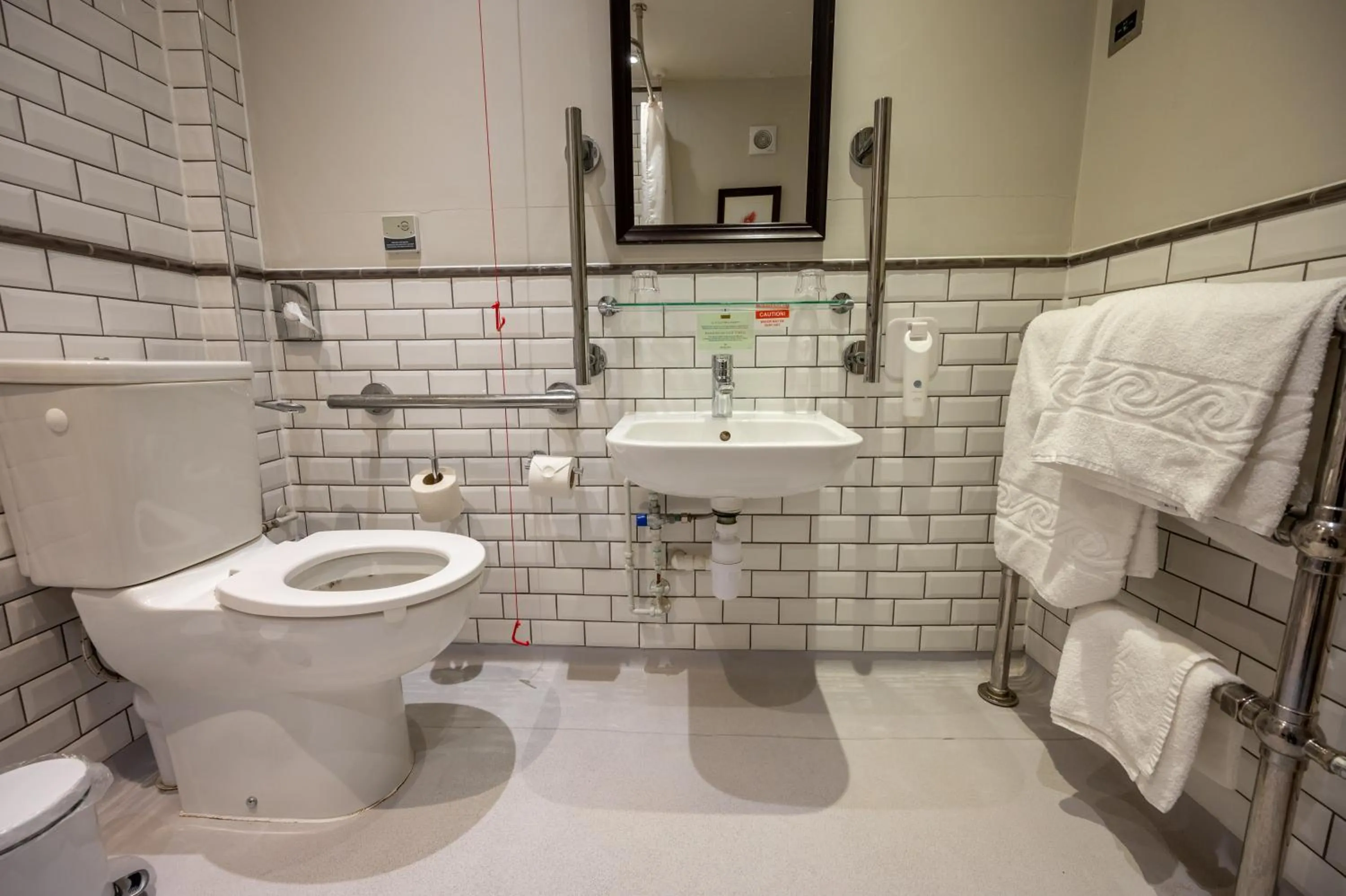 Bathroom in Cross Hands Hotel by Greene King Inns