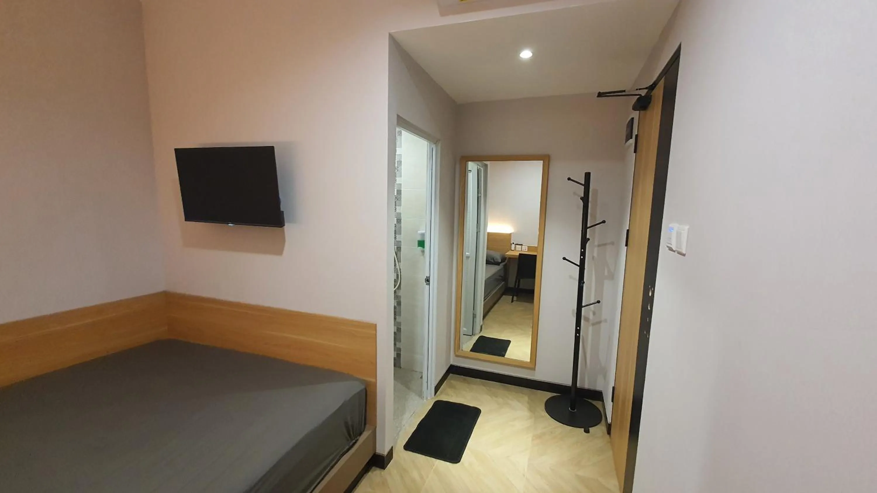 Bed in Check Inn Permata Hijau