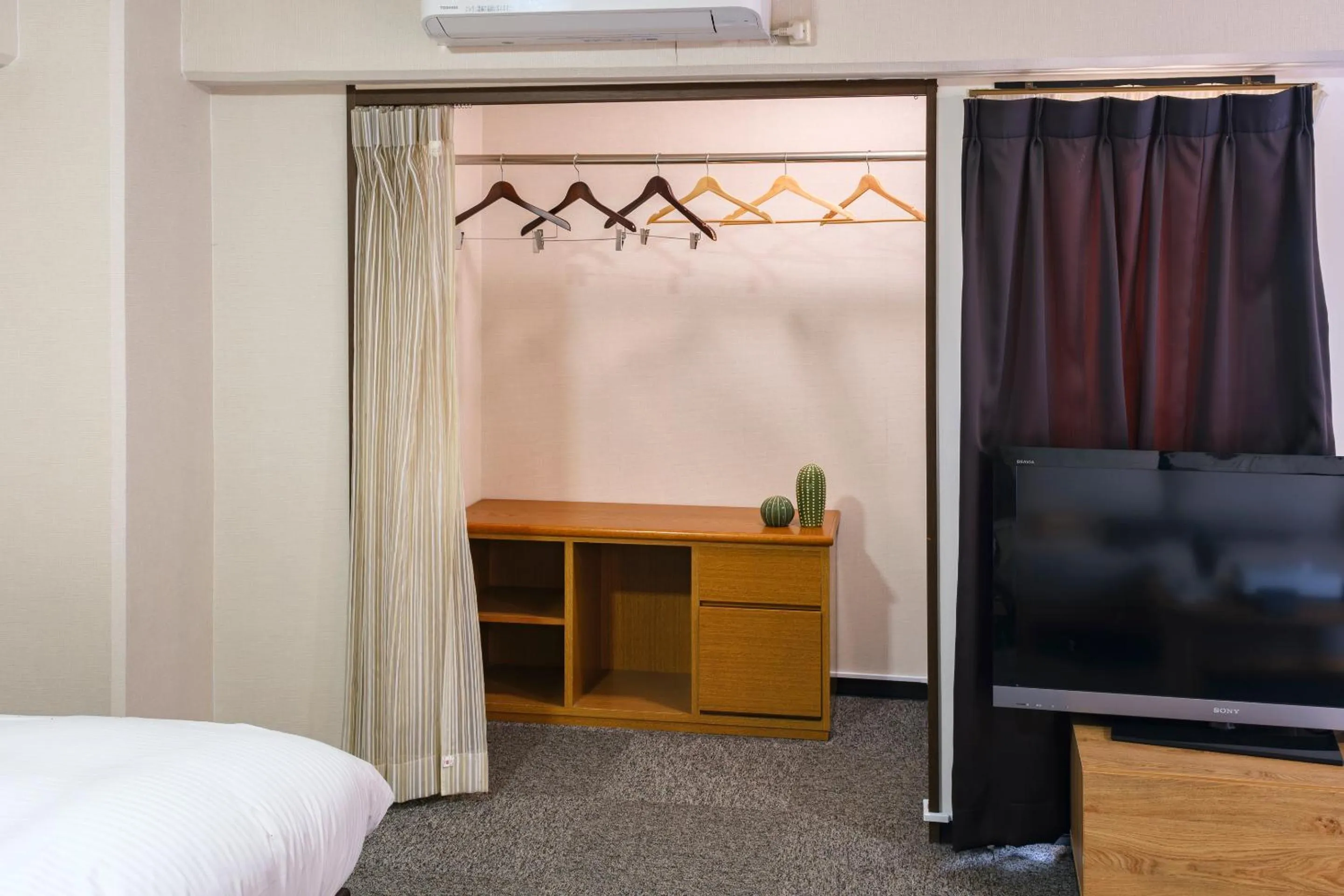 wardrobe, Bed in Miyazaki Mango Hotel