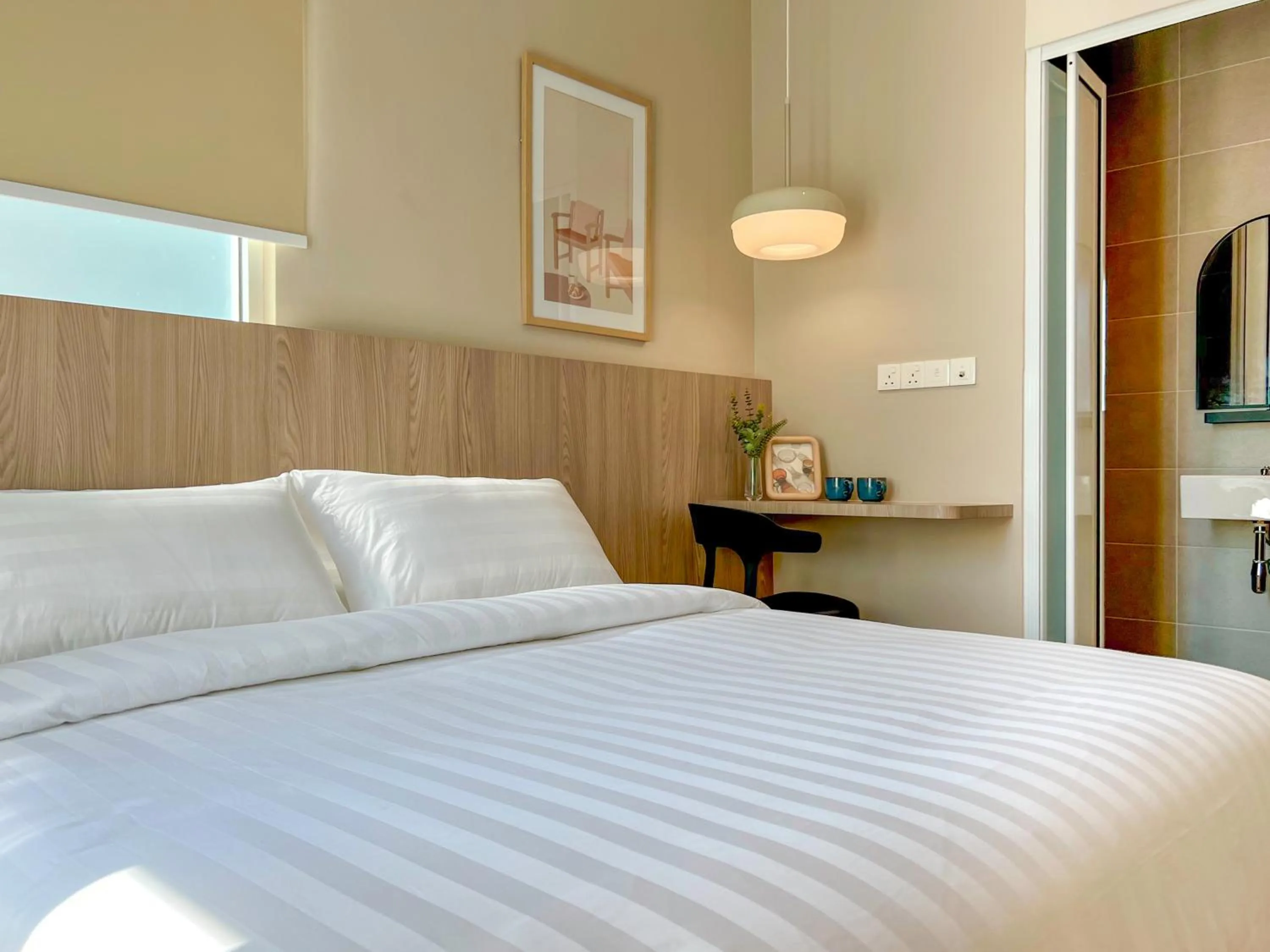 Bed in La Vie Hotel Juru