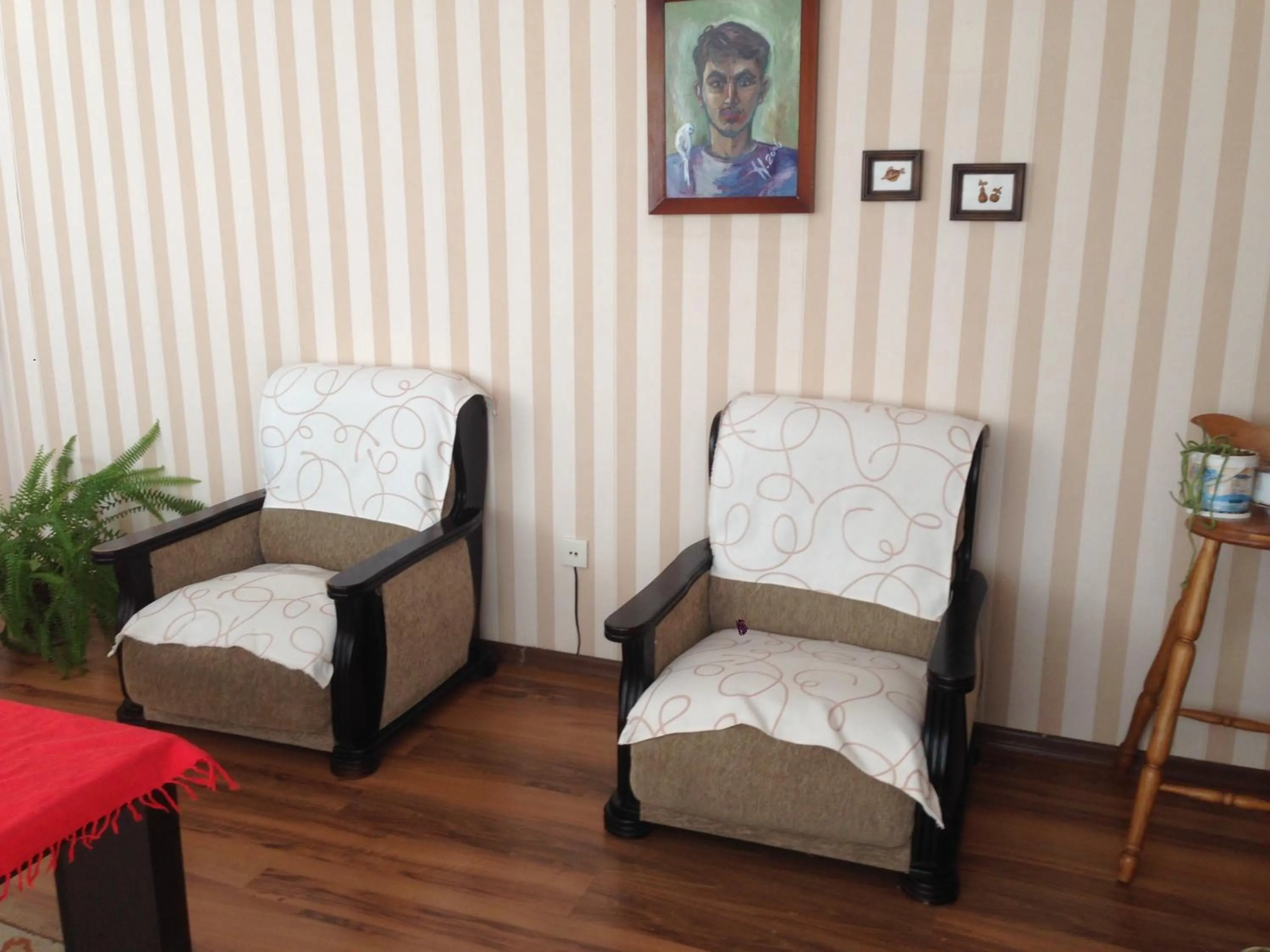 Communal lounge/ TV room in Your House In Tbilisi