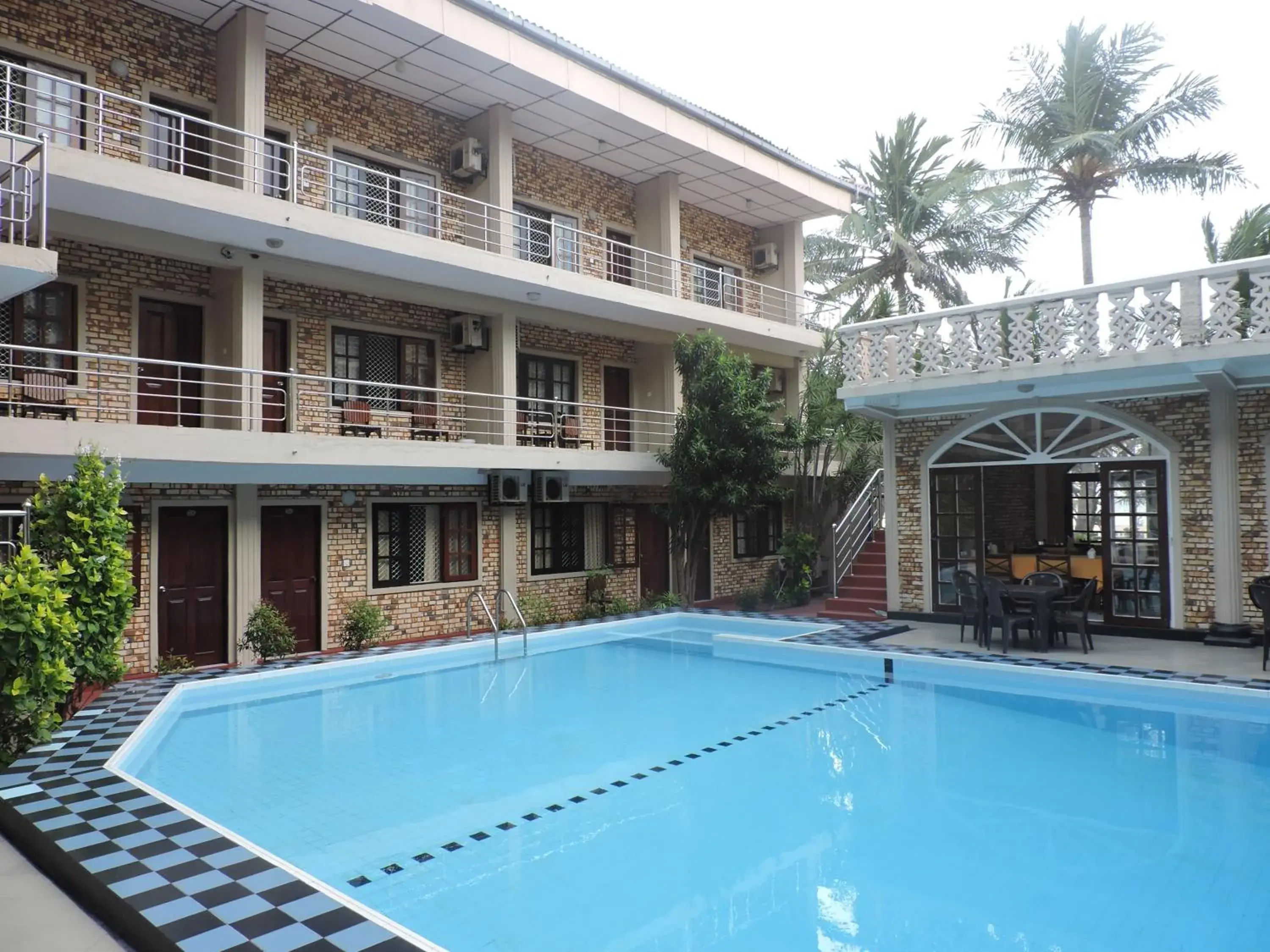 Property building in Oasis Beach Resort Property building in Oasis Beach Resort