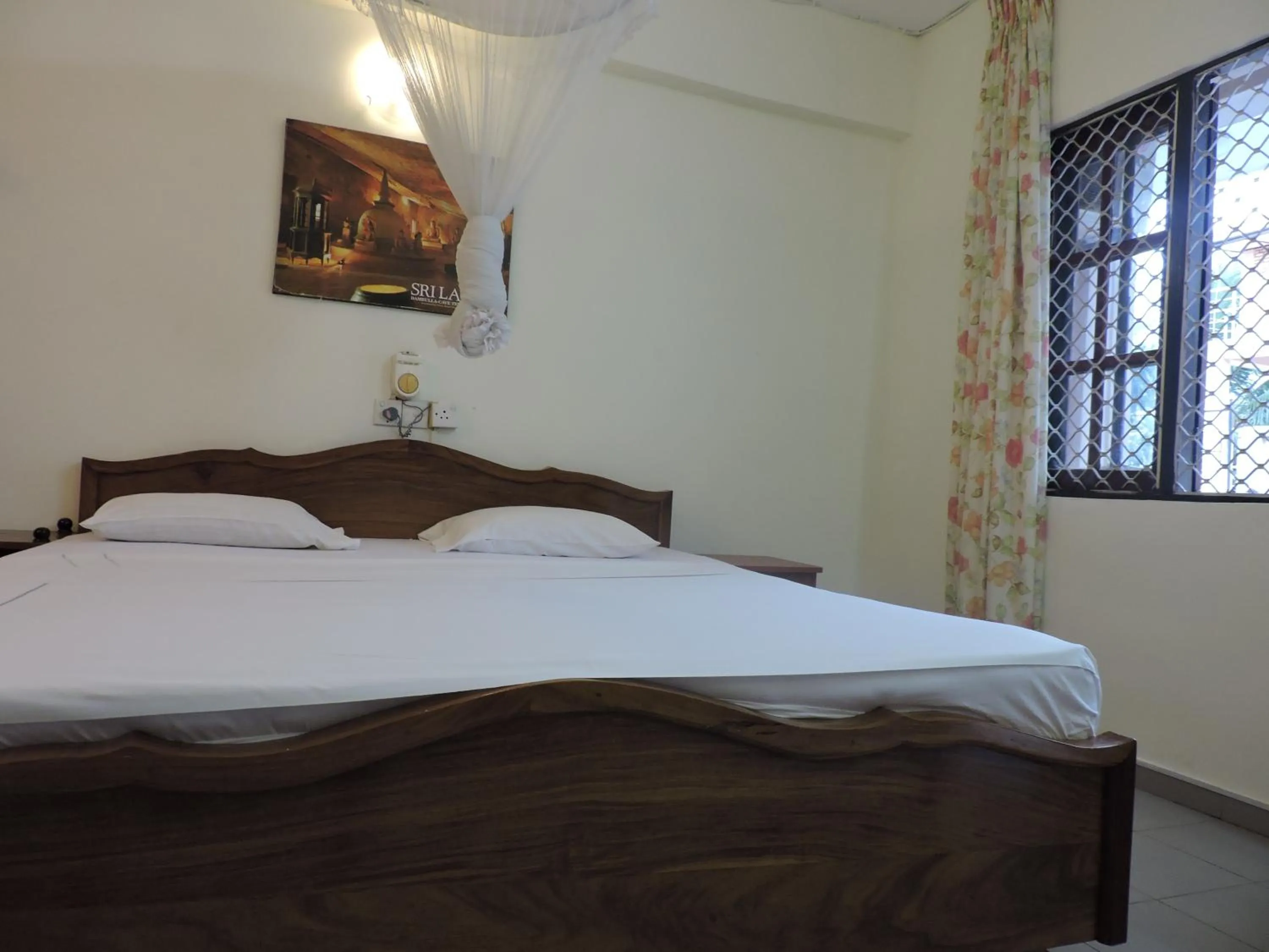 Bed in Oasis Beach Resort