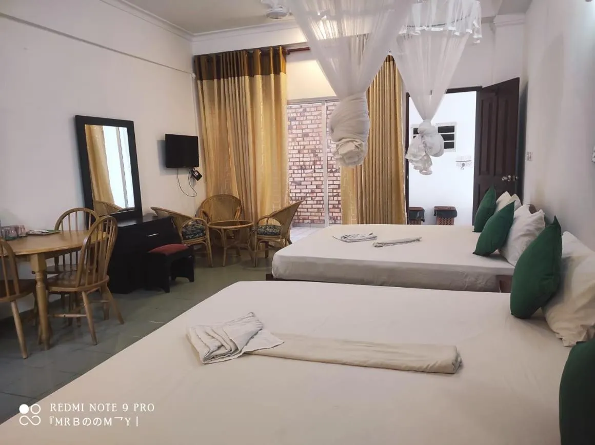 Bedroom, Bed in Oasis Beach Resort