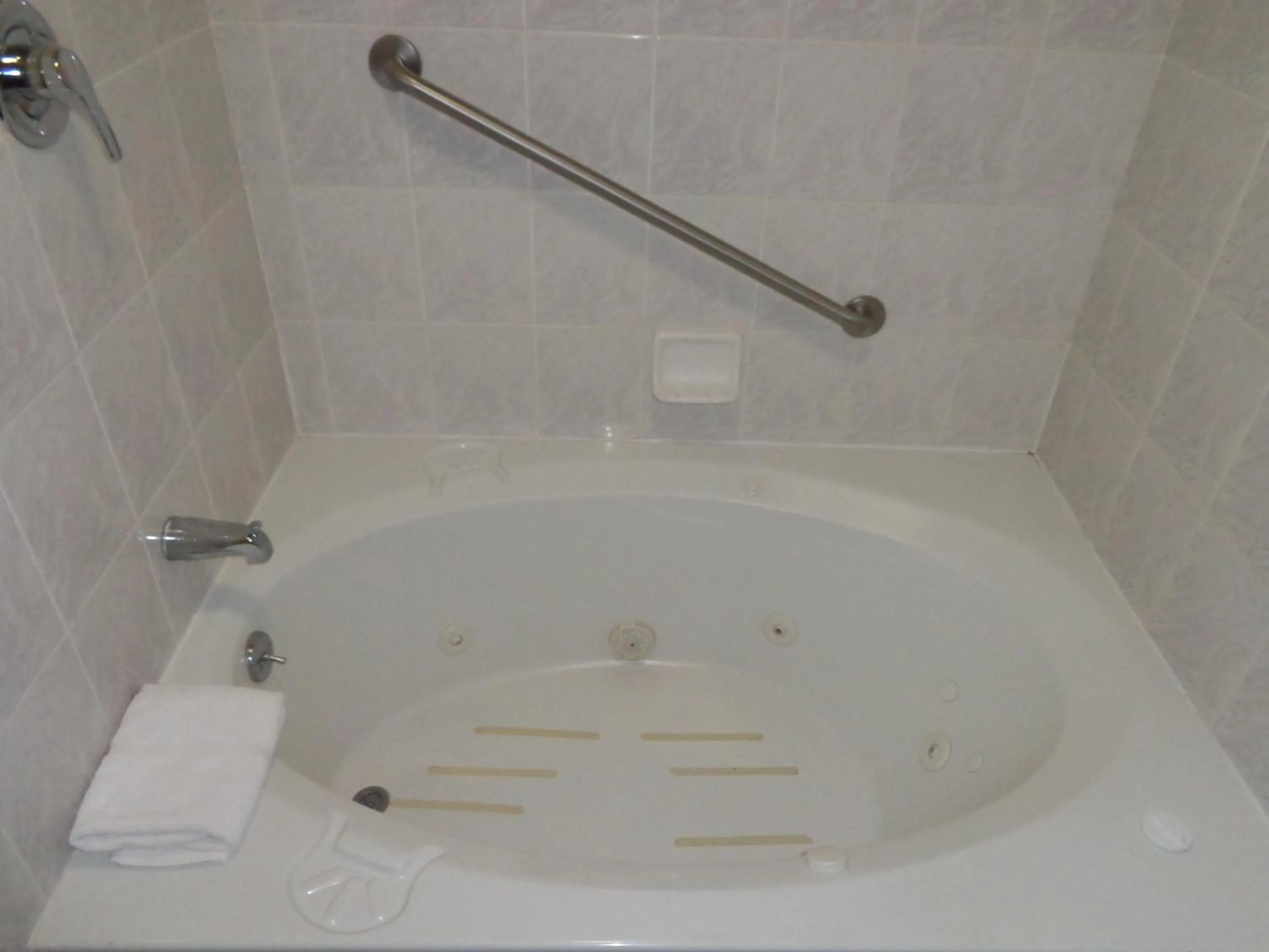 Bathroom in Travelodge by Wyndham Ridgeway Martinsville Area