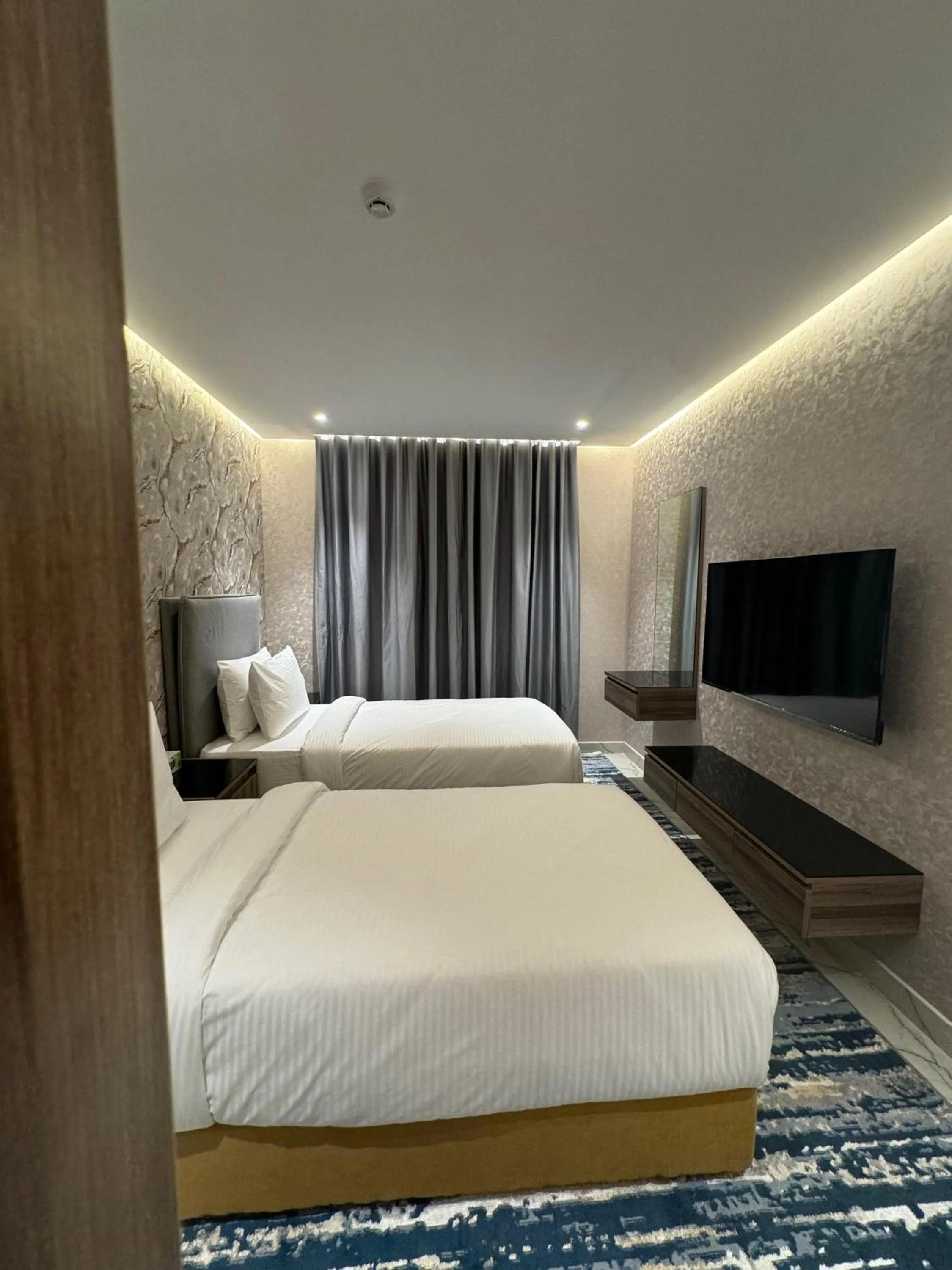 Bed in Royal Plaza Hotel