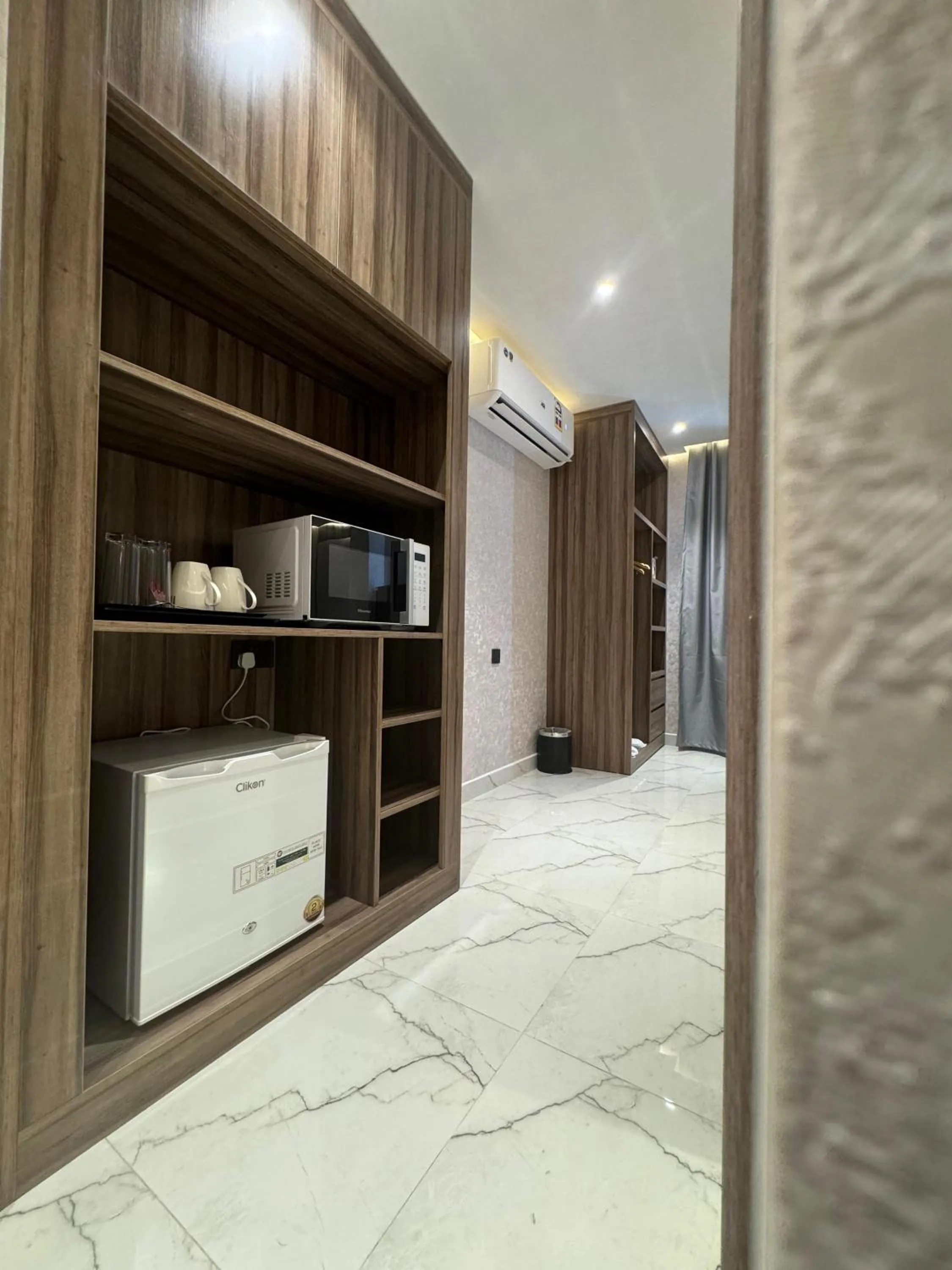 Kitchen or kitchenette in Royal Plaza Hotel