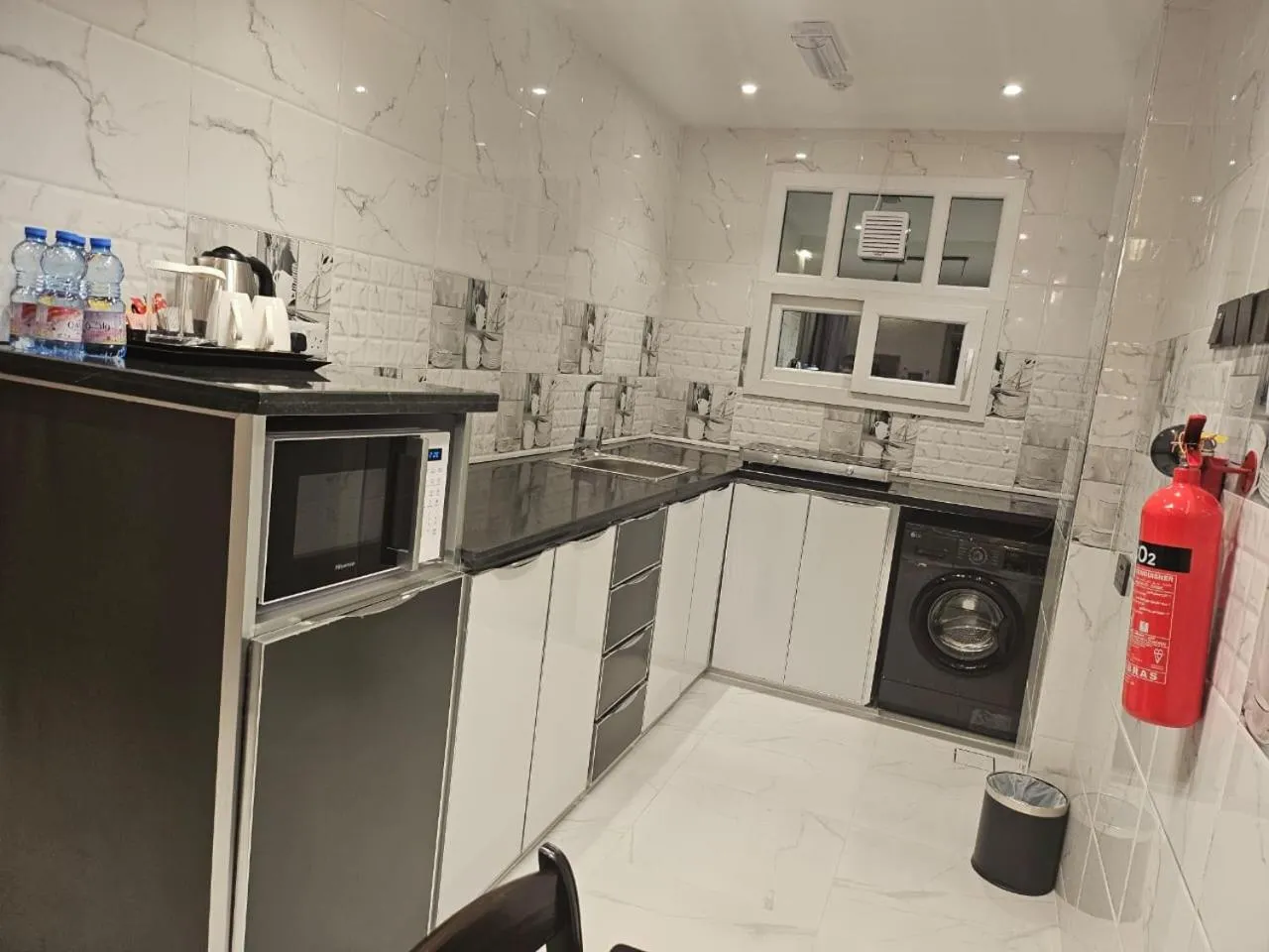 Kitchen or kitchenette in Royal Plaza Hotel