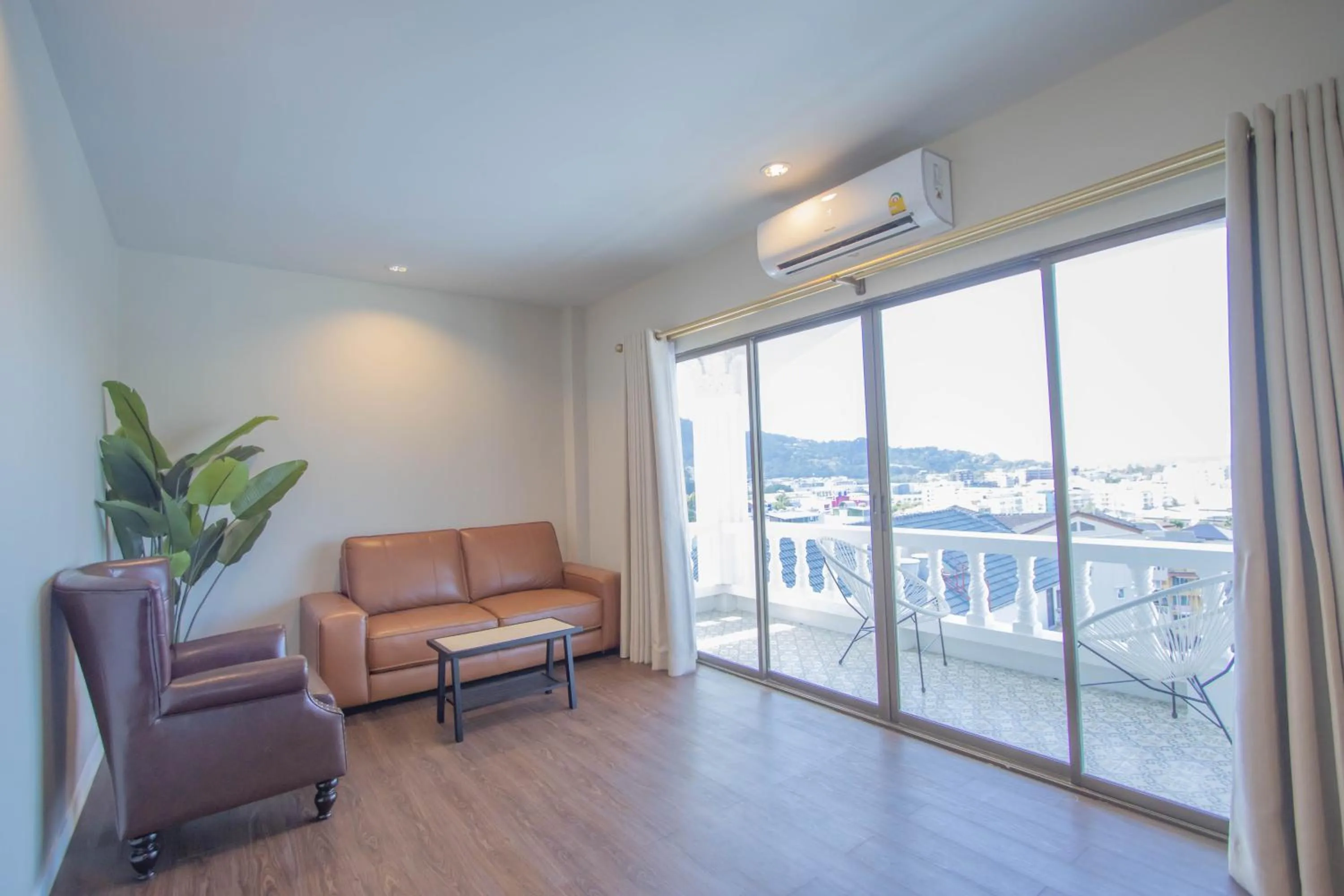 Living room in RoomQuest The Peak Patong Hill