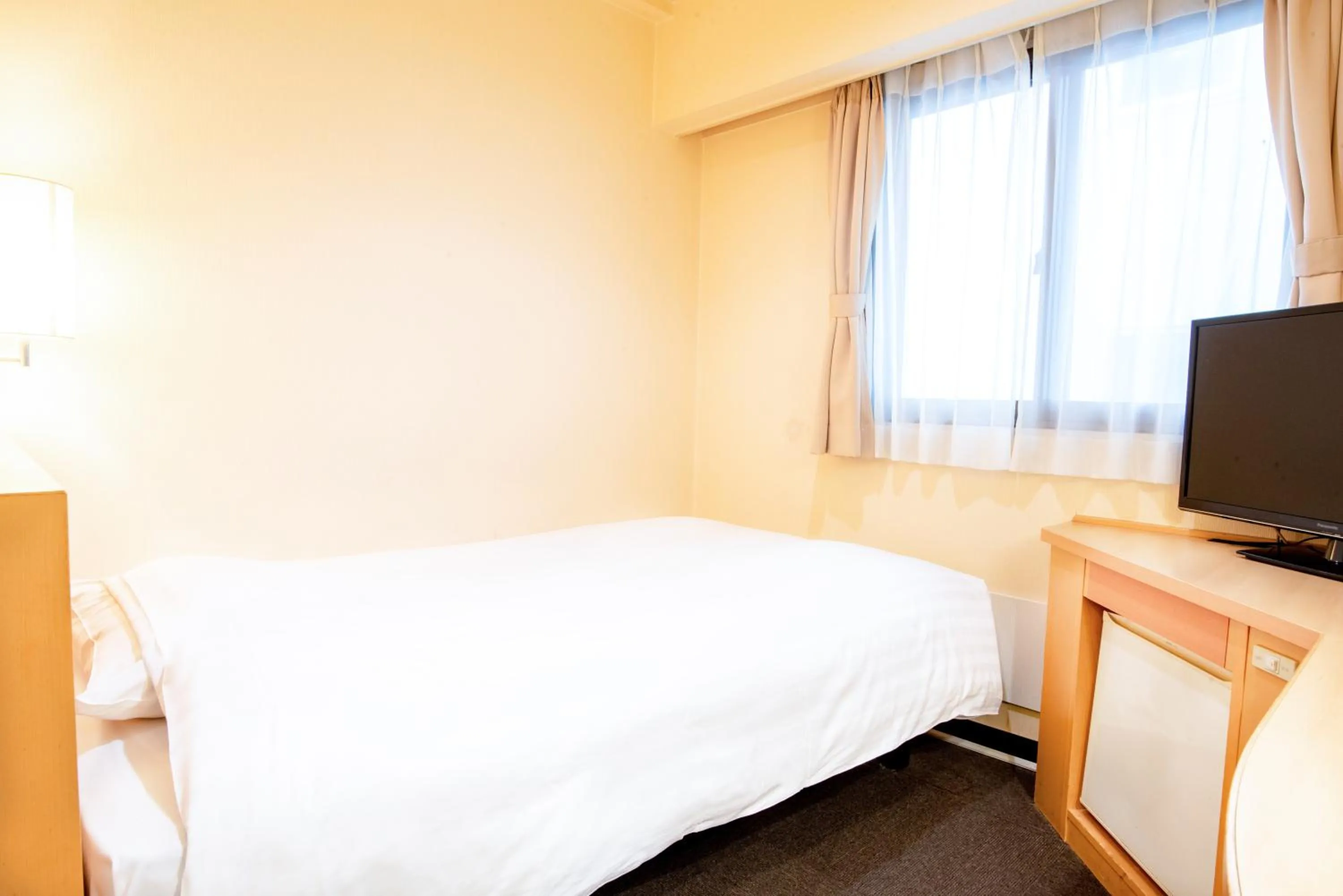 Bed in le Lac Hotel Yokkaichi