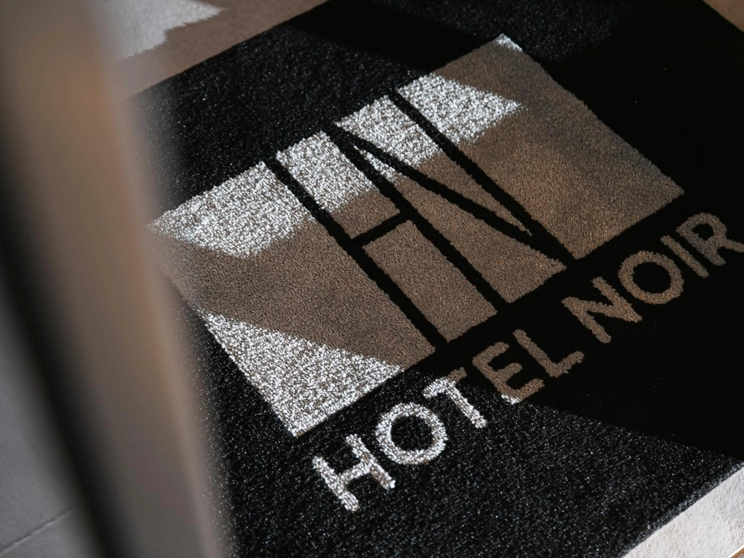 Property logo or sign in HOTEL NOIR Kagoshima Chuo Station