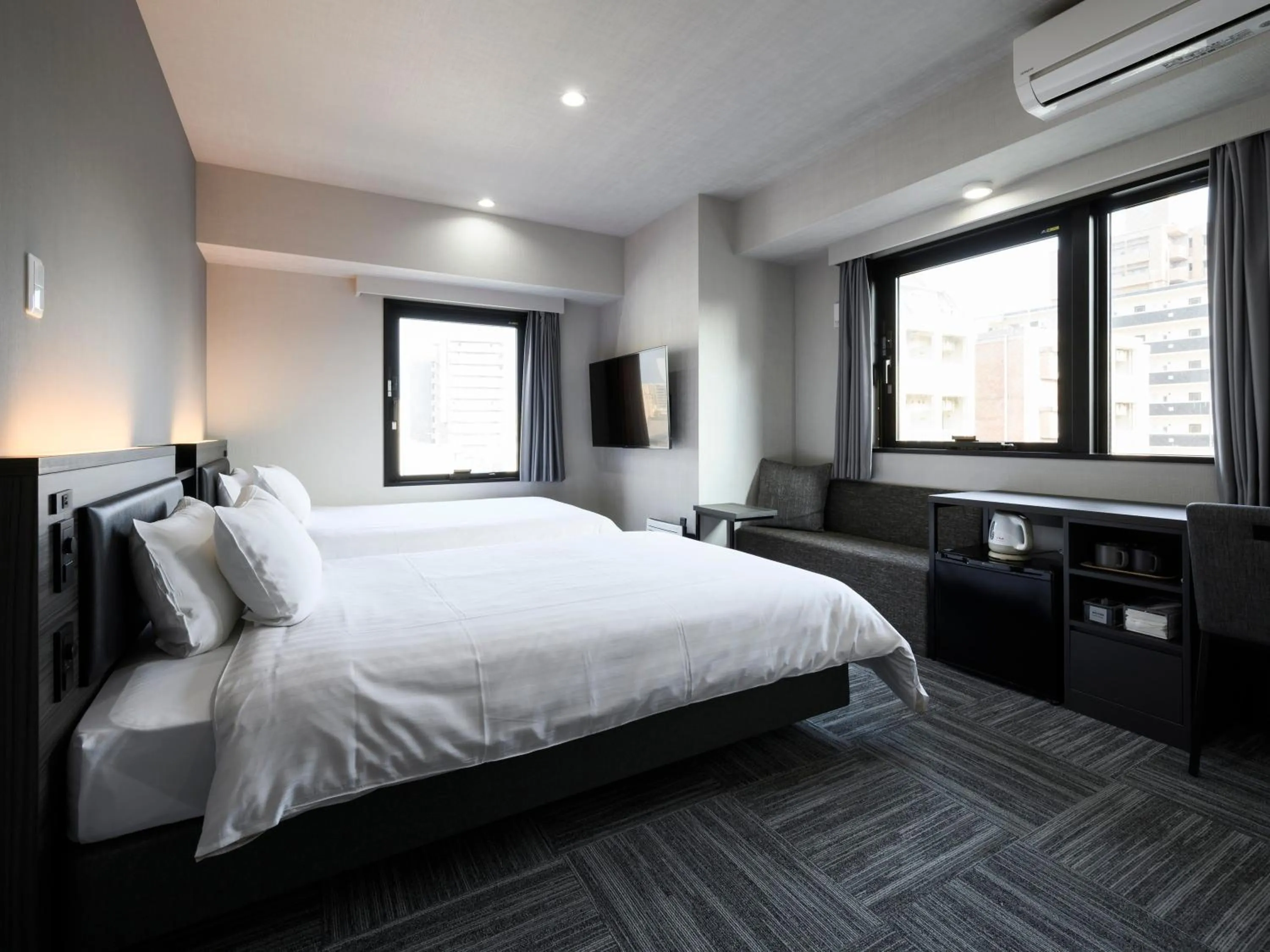 Photo of the whole room, Bed in HOTEL NOIR Kagoshima Chuo Station