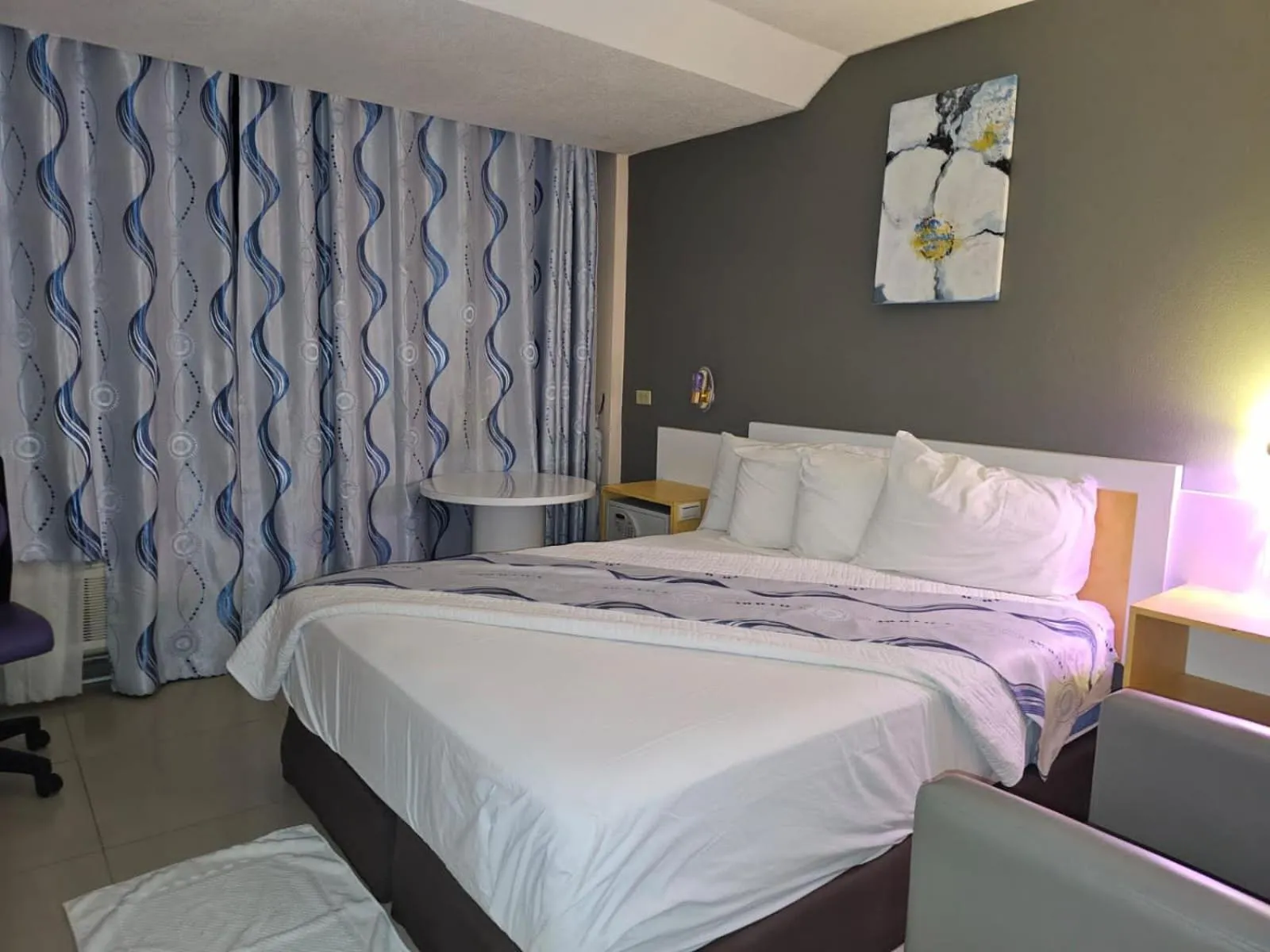 Bed in Golden Tree Hotel Belize