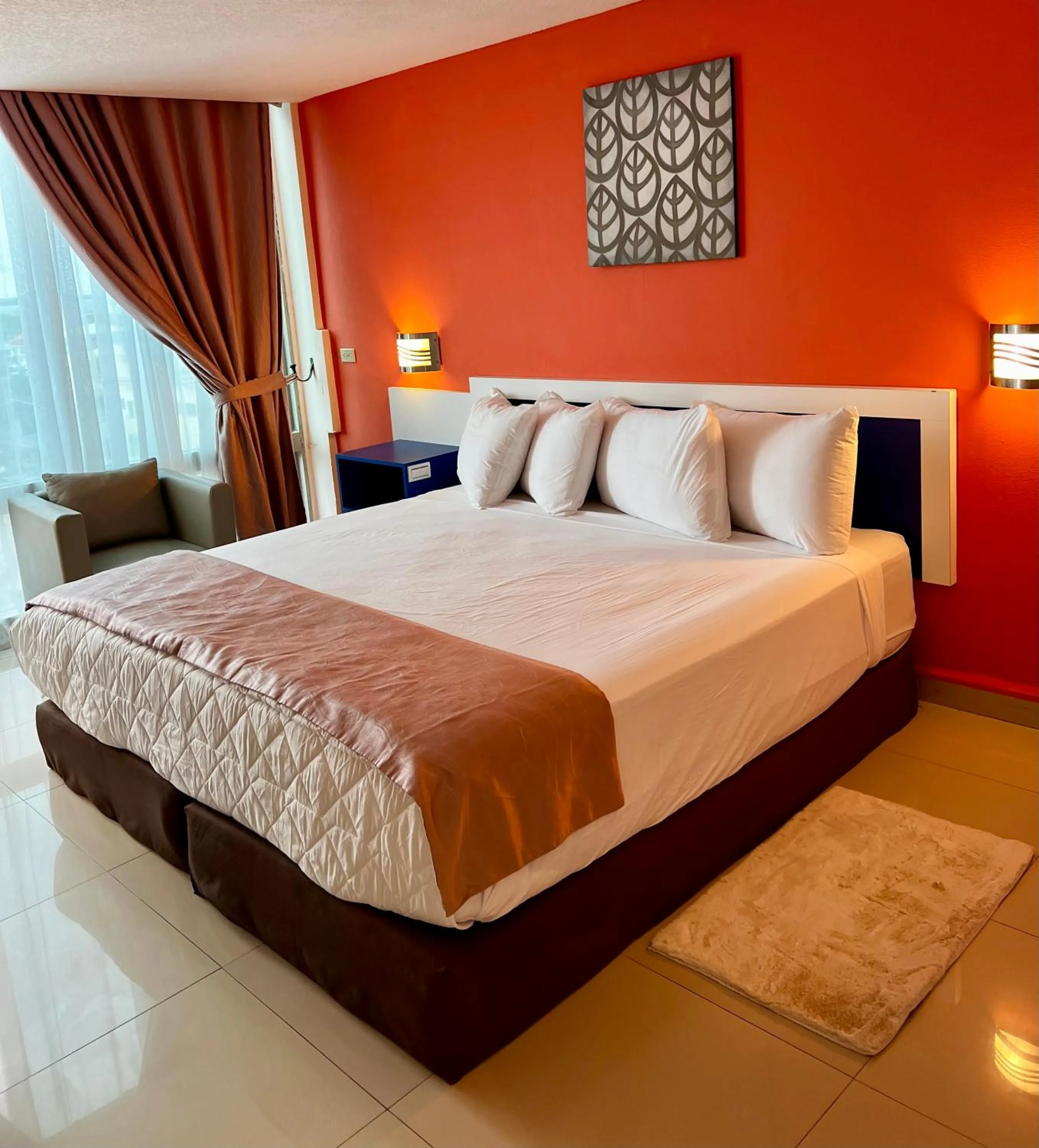 Bed in Golden Tree Hotel Belize
