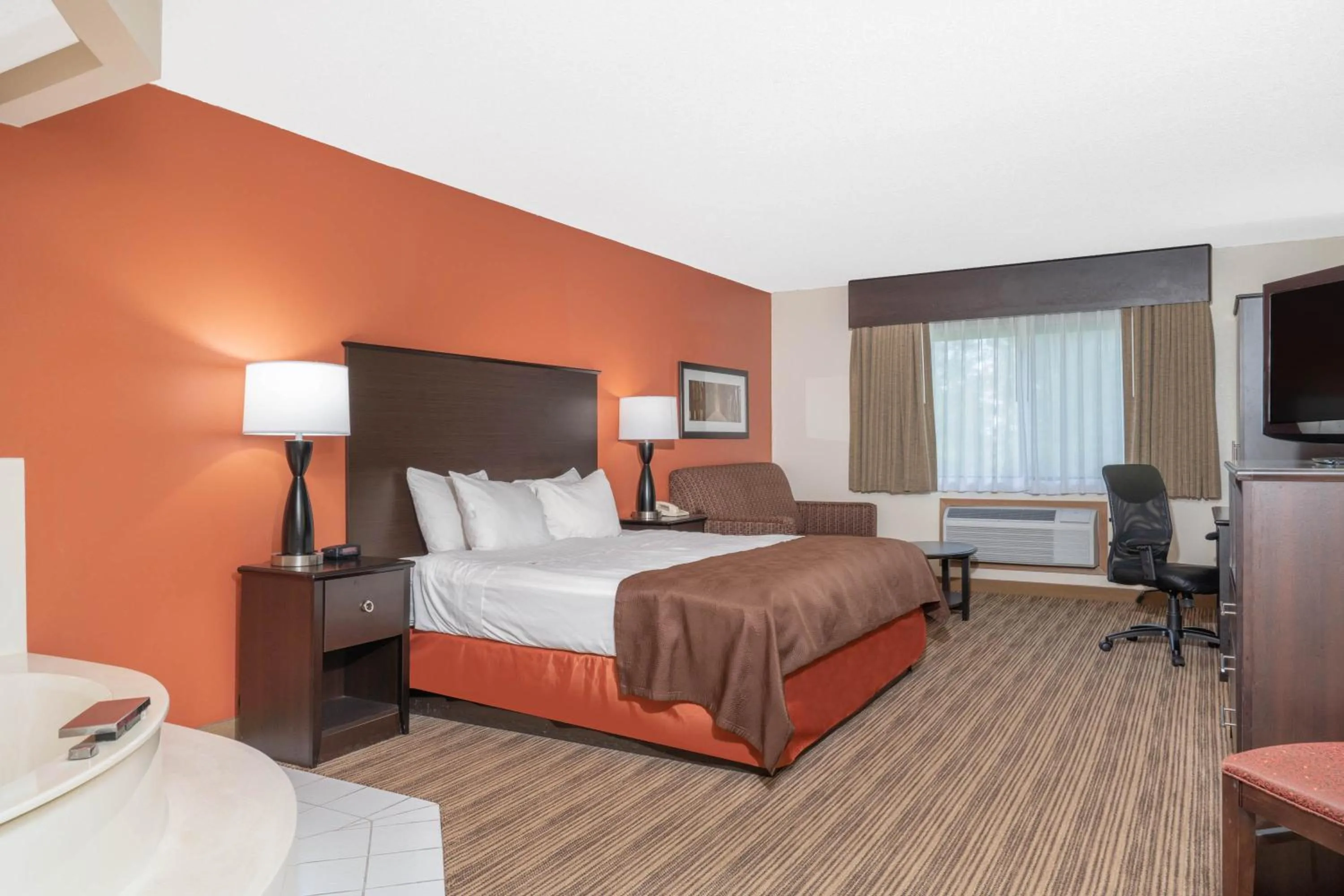 Bedroom, Bed in Aspen Hotel Rogers Formerly Americ inn