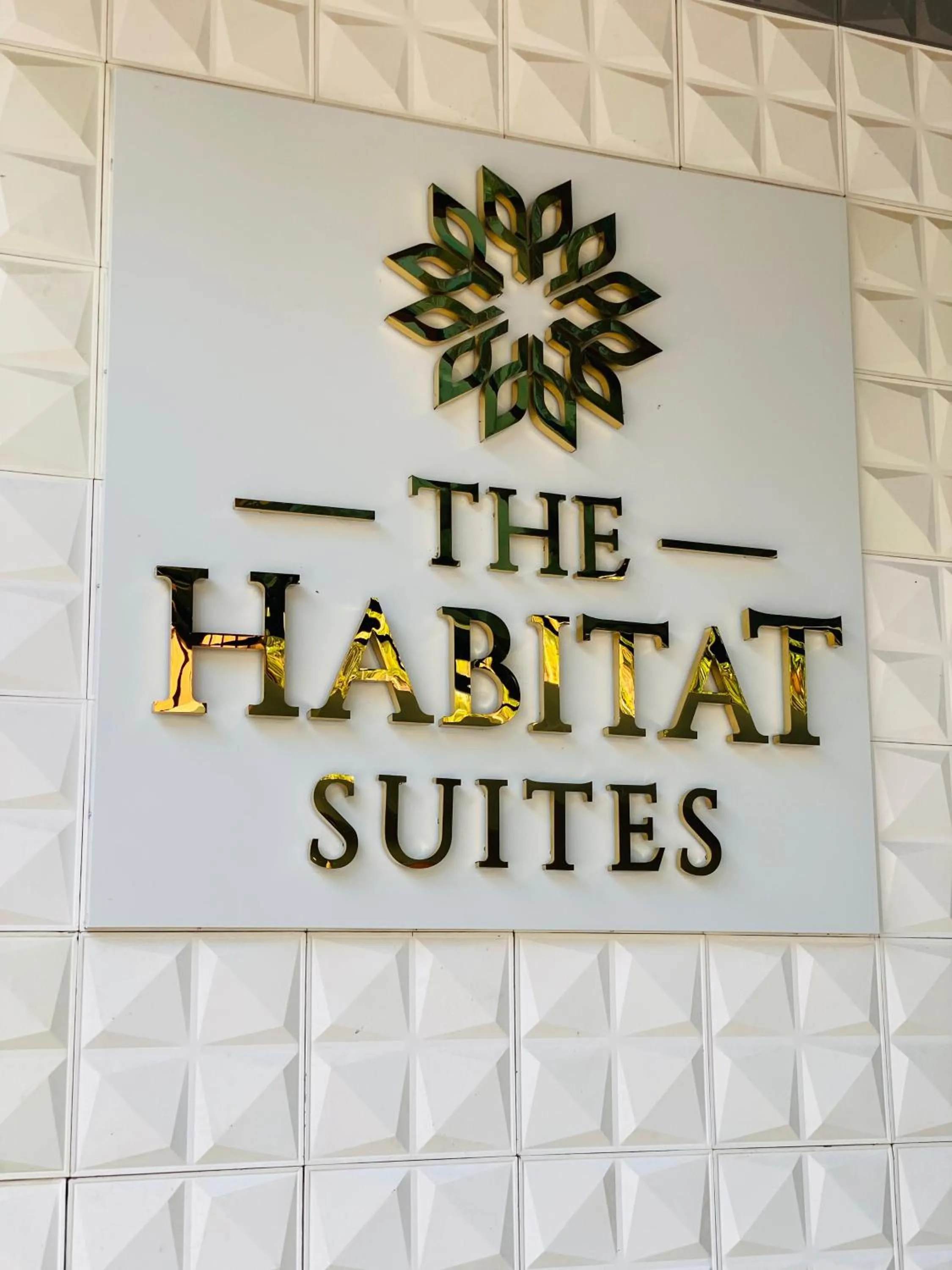 Logo/Certificate/Sign in The Habitat Suites-Walkable distance to Guruvayoor temple