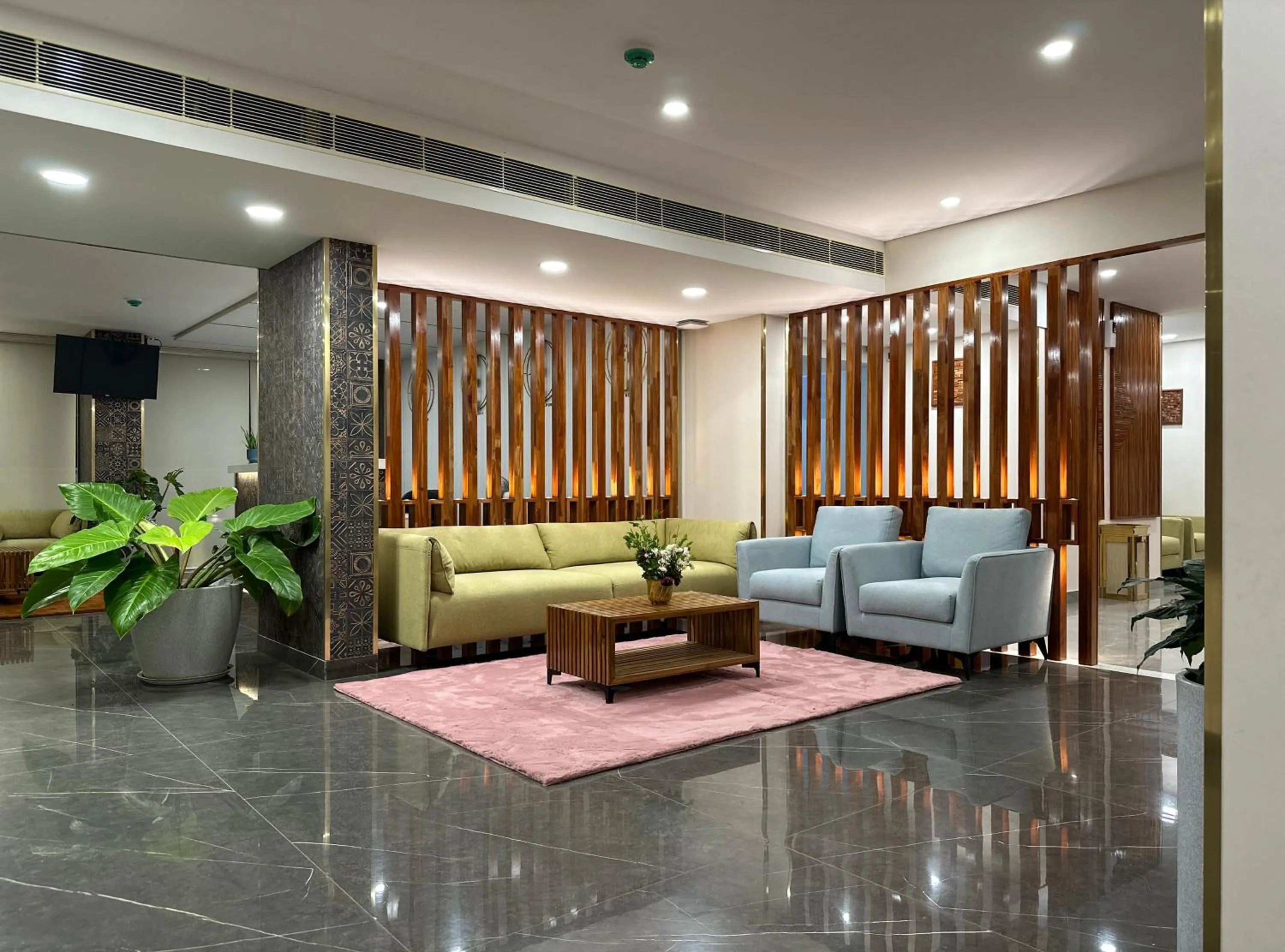 Seating area in The Habitat Suites-Walkable distance to Guruvayoor temple