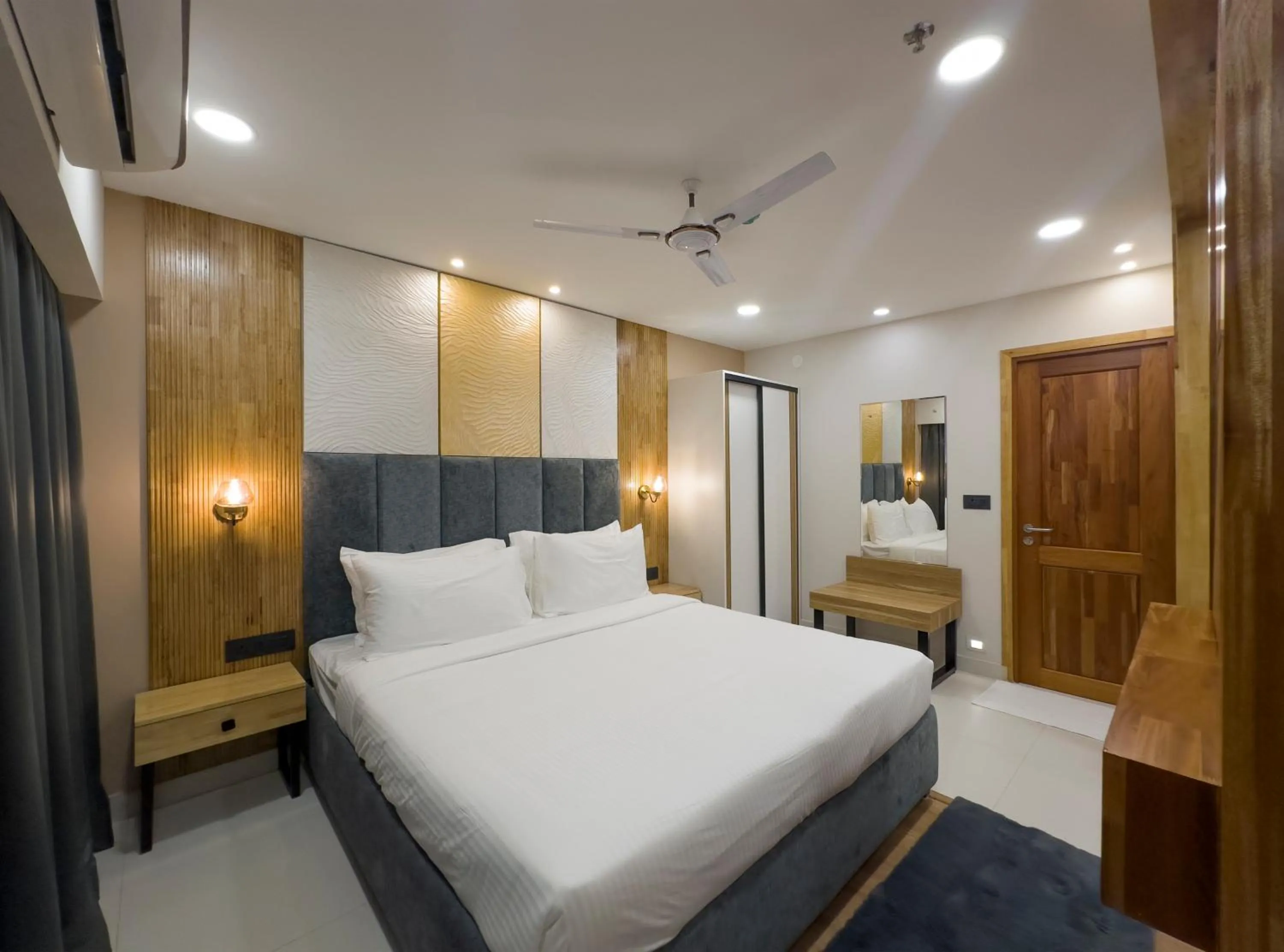 Photo of the whole room, Bed in The Habitat Suites-Walkable distance to Guruvayoor temple