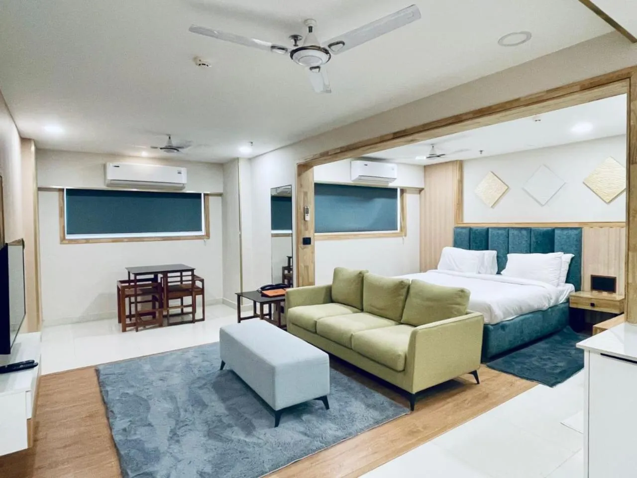 Living room, Bed in The Habitat Suites-Walkable distance to Guruvayoor temple