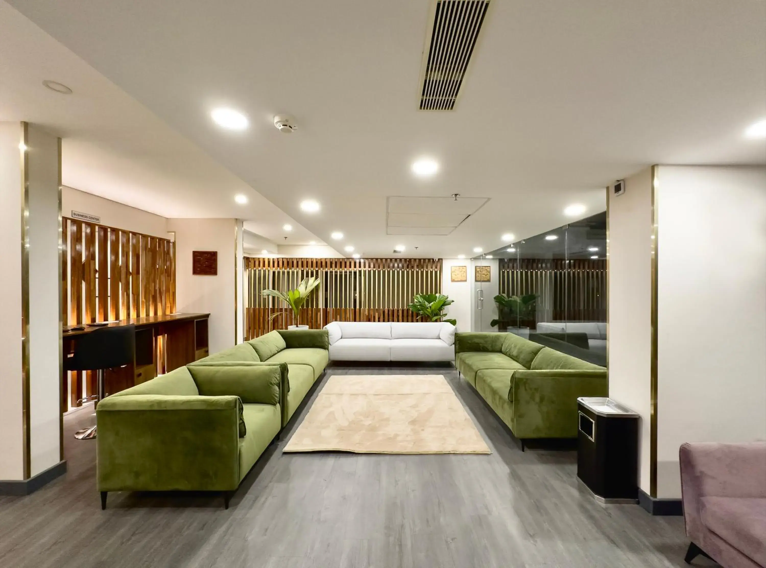 Living room, Bed in The Habitat Suites-Walkable distance to Guruvayoor temple Living room, Bed in The Habitat Suites-Walkable distance to Guruvayoor temple