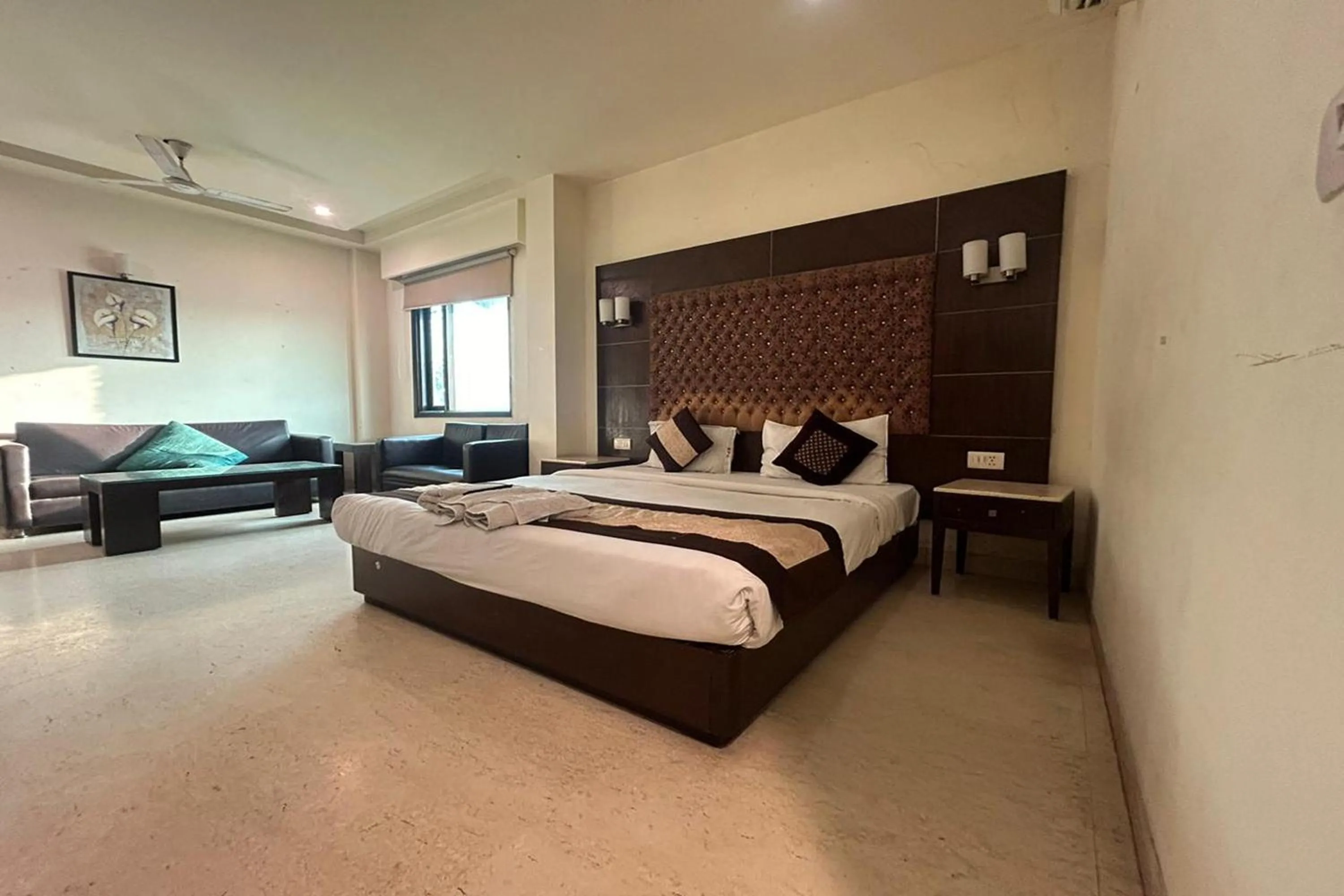 Photo of the whole room, Bed in The Metropolis Guest House Near RK Ashram Metro Station