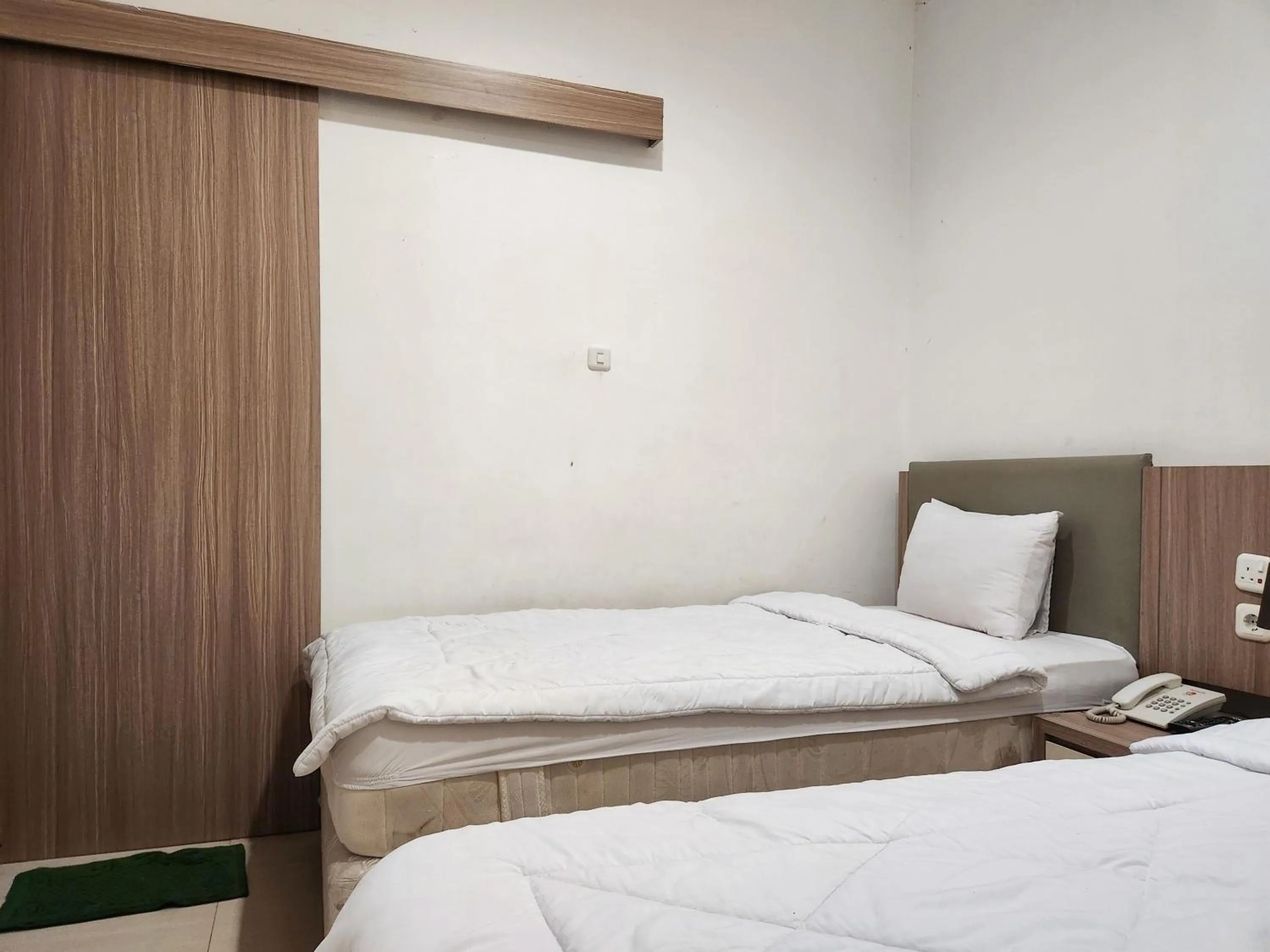 Bed in Joker Hotel & Residence