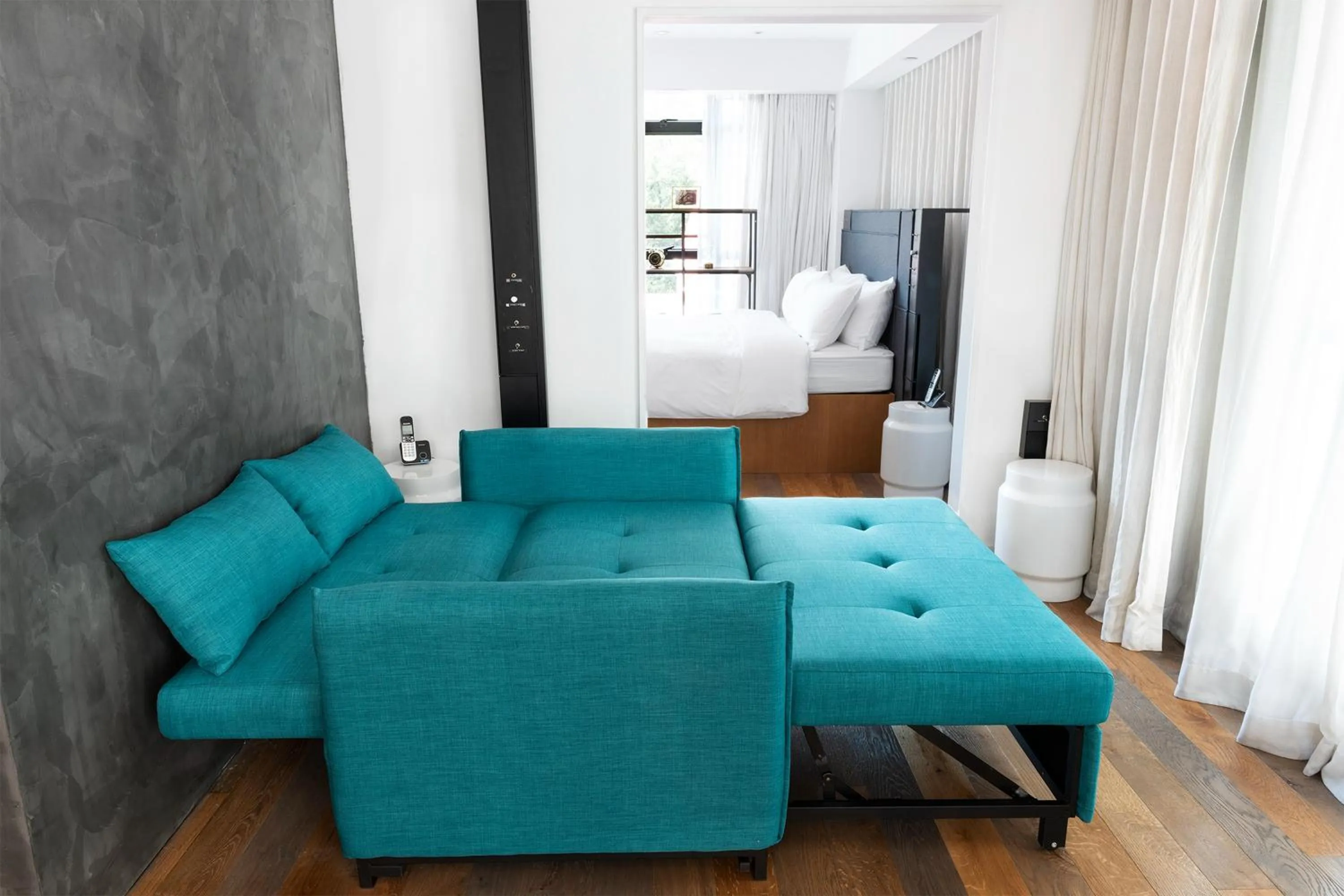 Bed, Seating Area in Residence G Hong Kong - by Hotel G