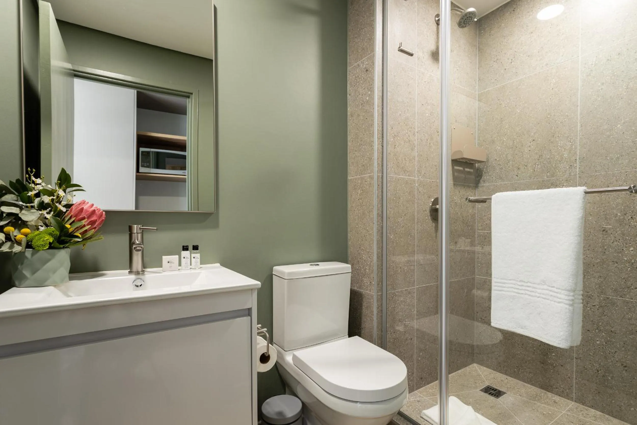 Bathroom in Habitat Aparthotel by Totalstay