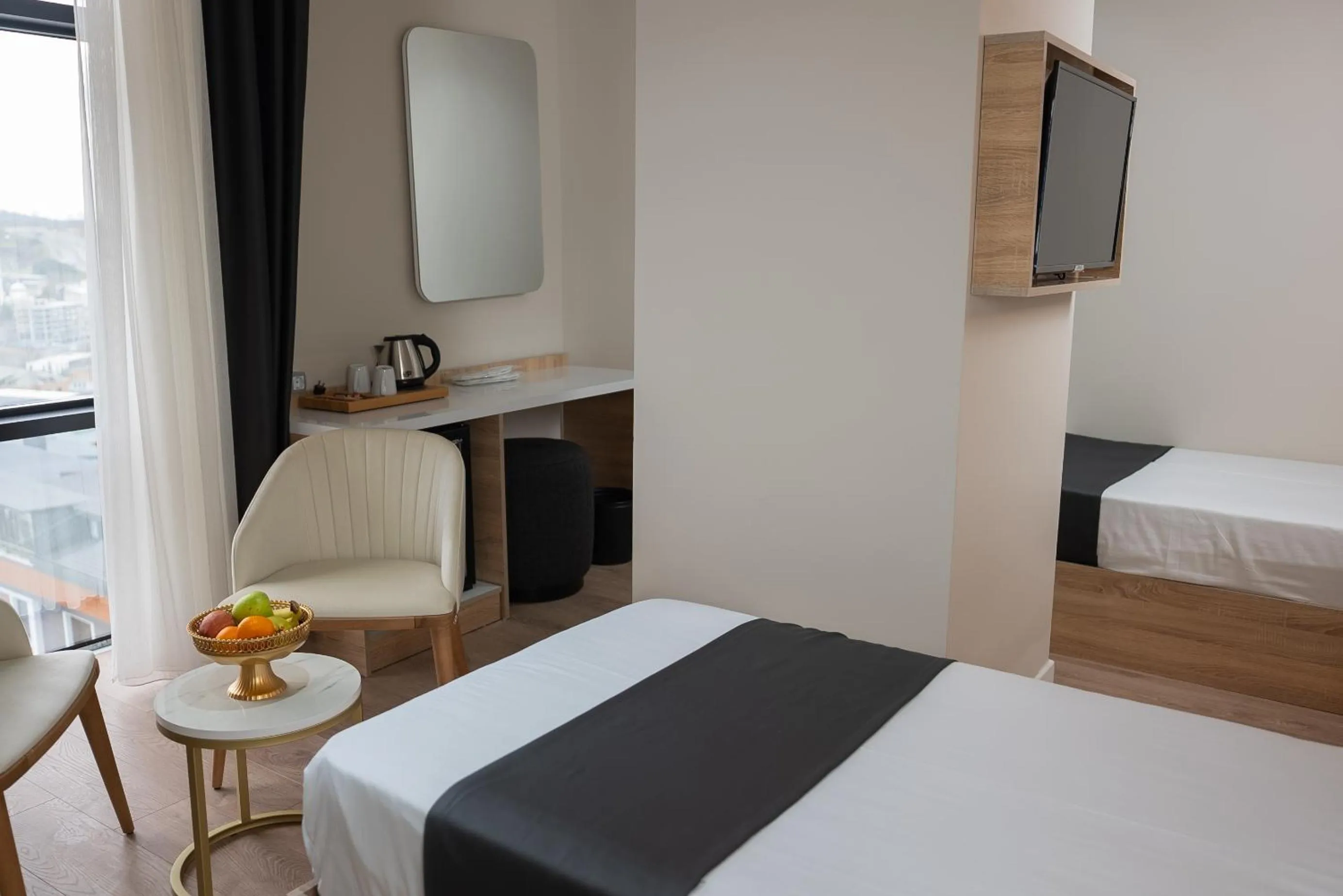 Bed in Golden River Hotel By Continent