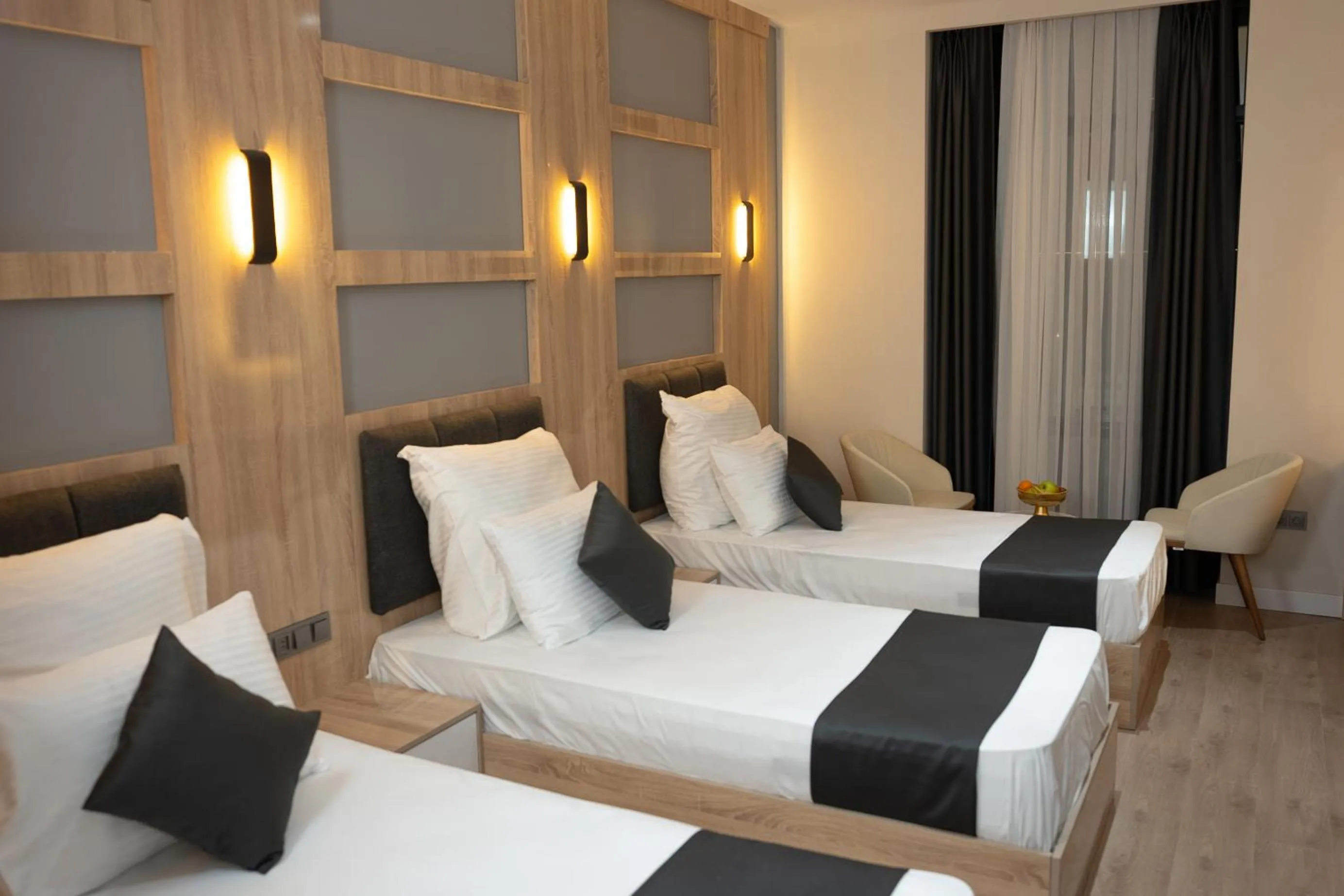 Bed in Golden River Hotel By Continent