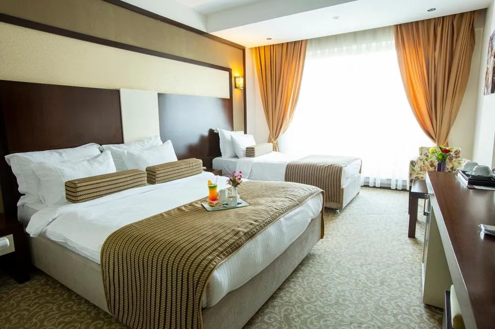 Bed in Lavin Hotel & Spa