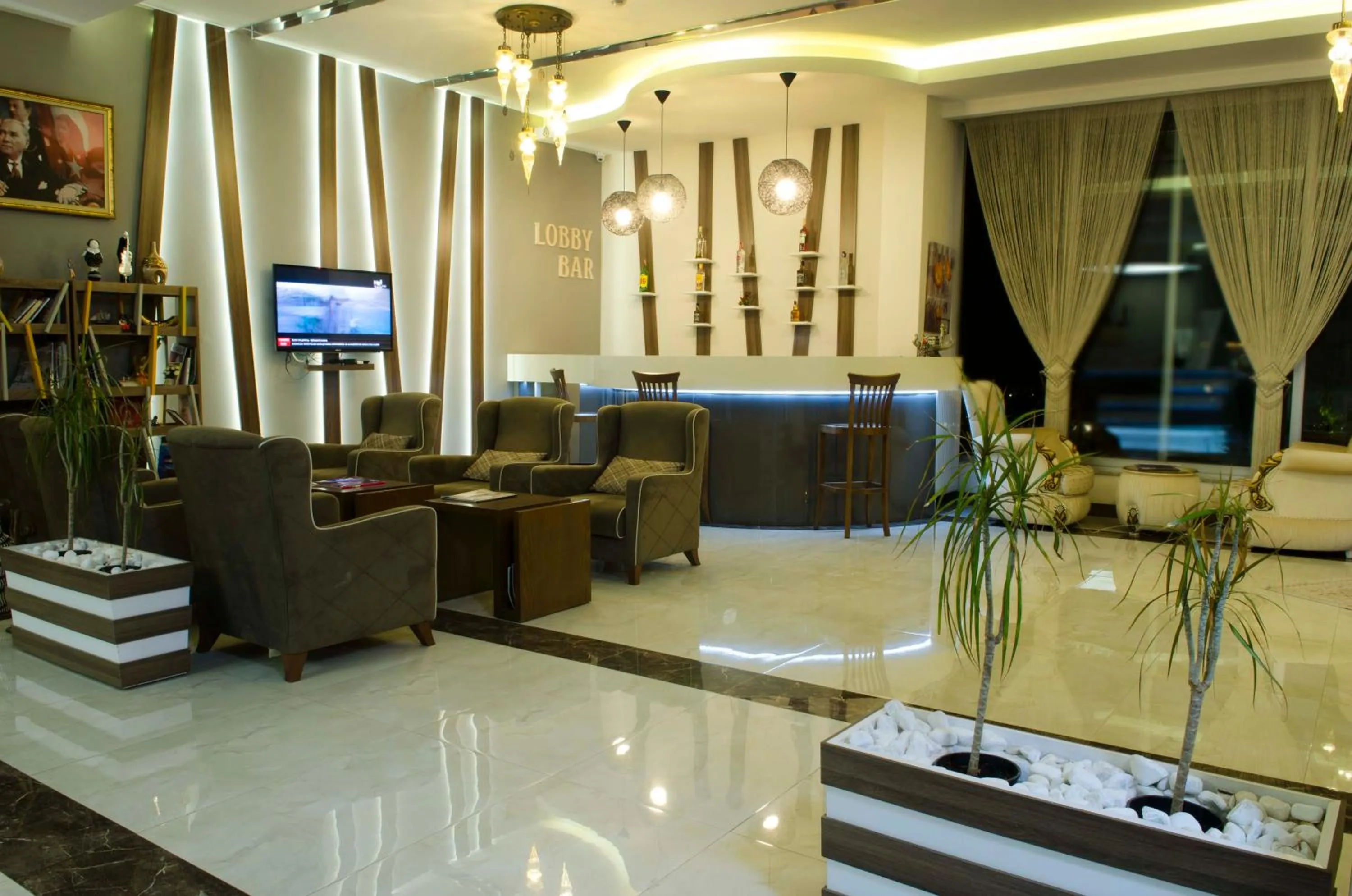 Communal lounge/ TV room in Lavin Hotel & Spa