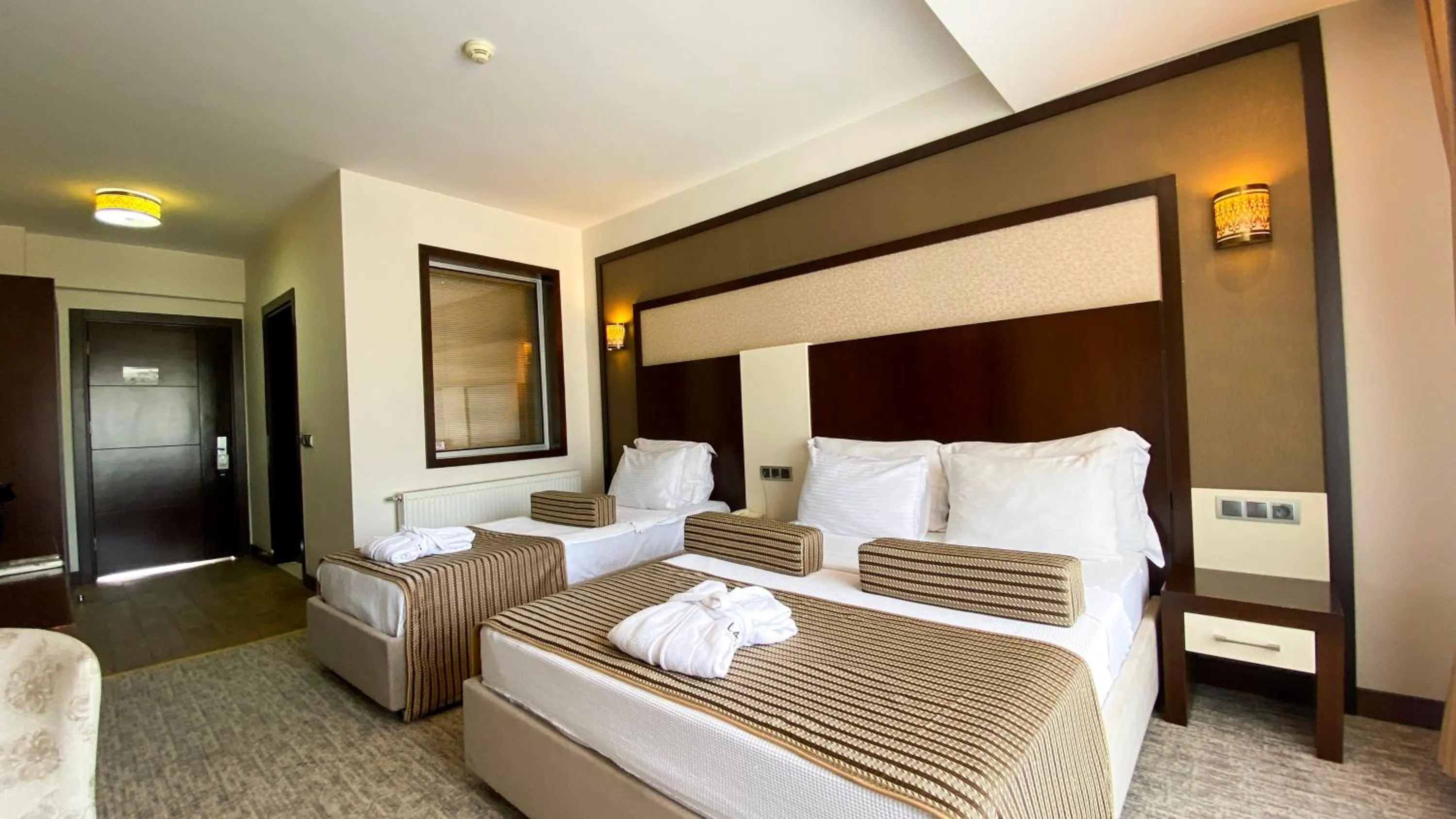 Photo of the whole room, Bed in Lavin Hotel & Spa