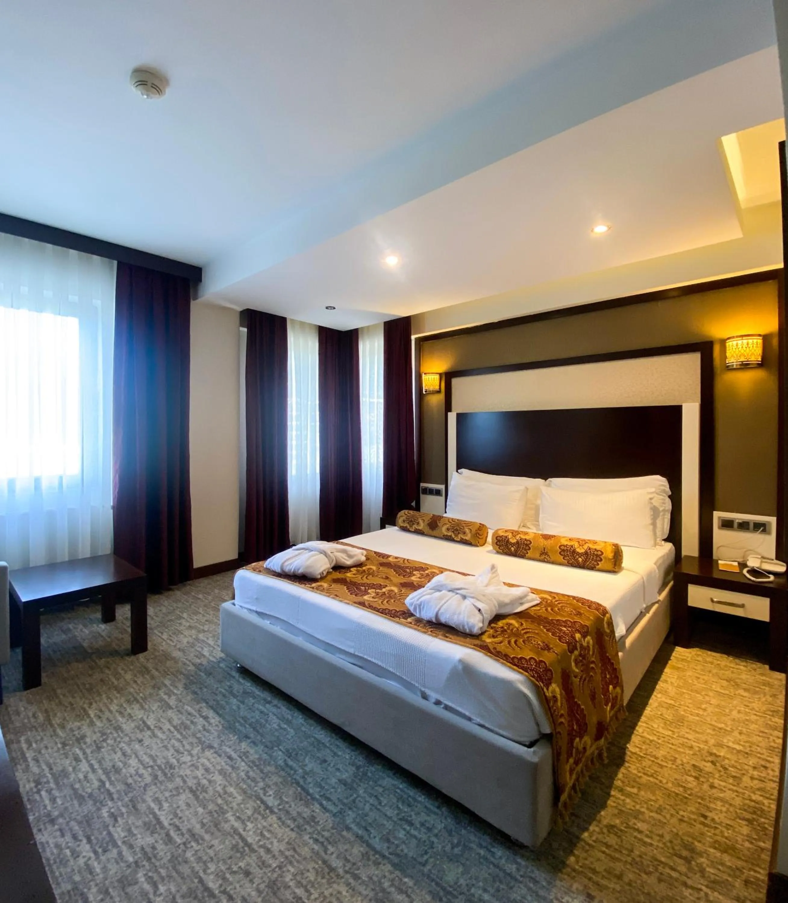 Photo of the whole room, Bed in Lavin Hotel & Spa