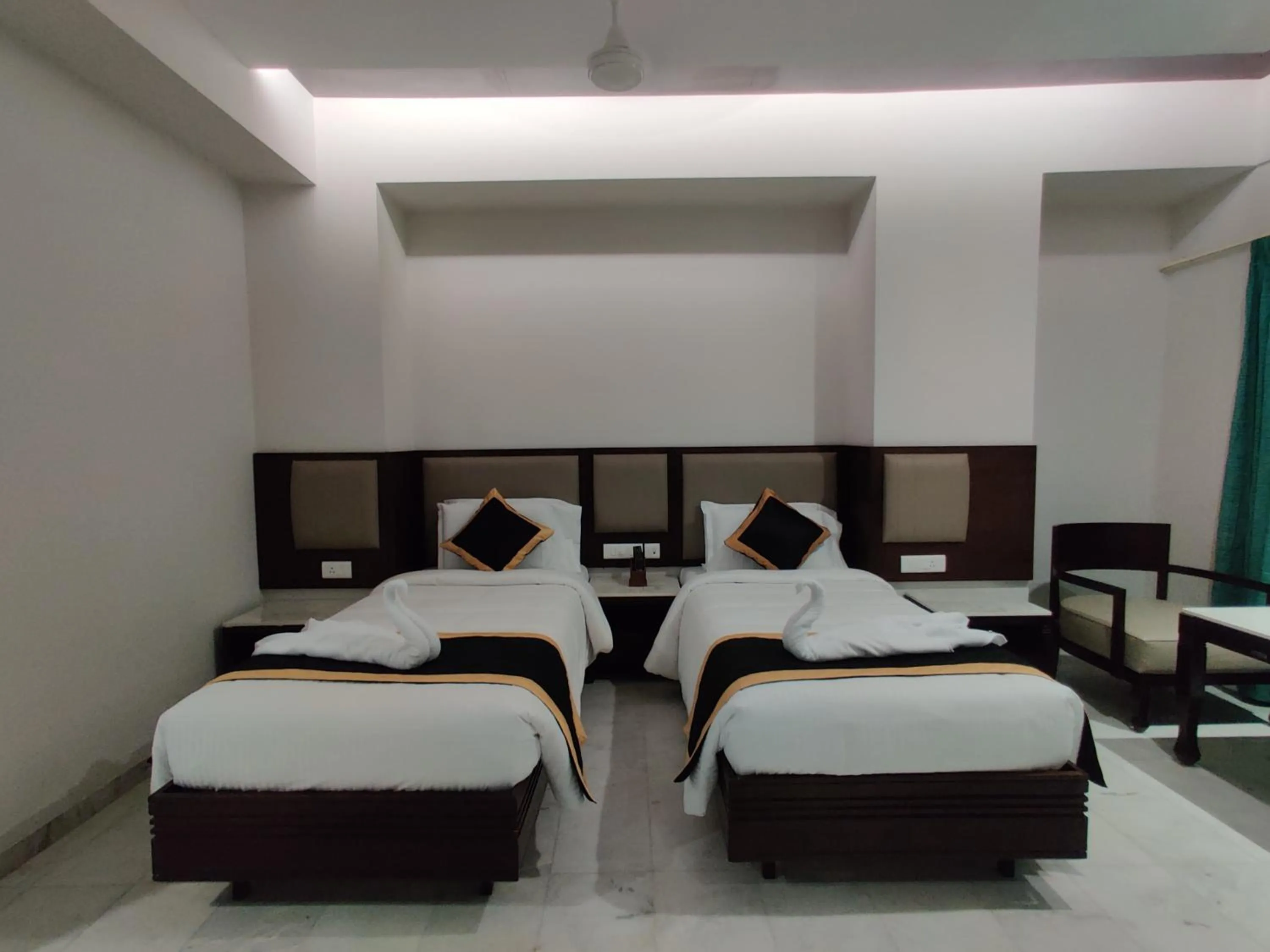 Bedroom, Bed in Hotel Saratharajans