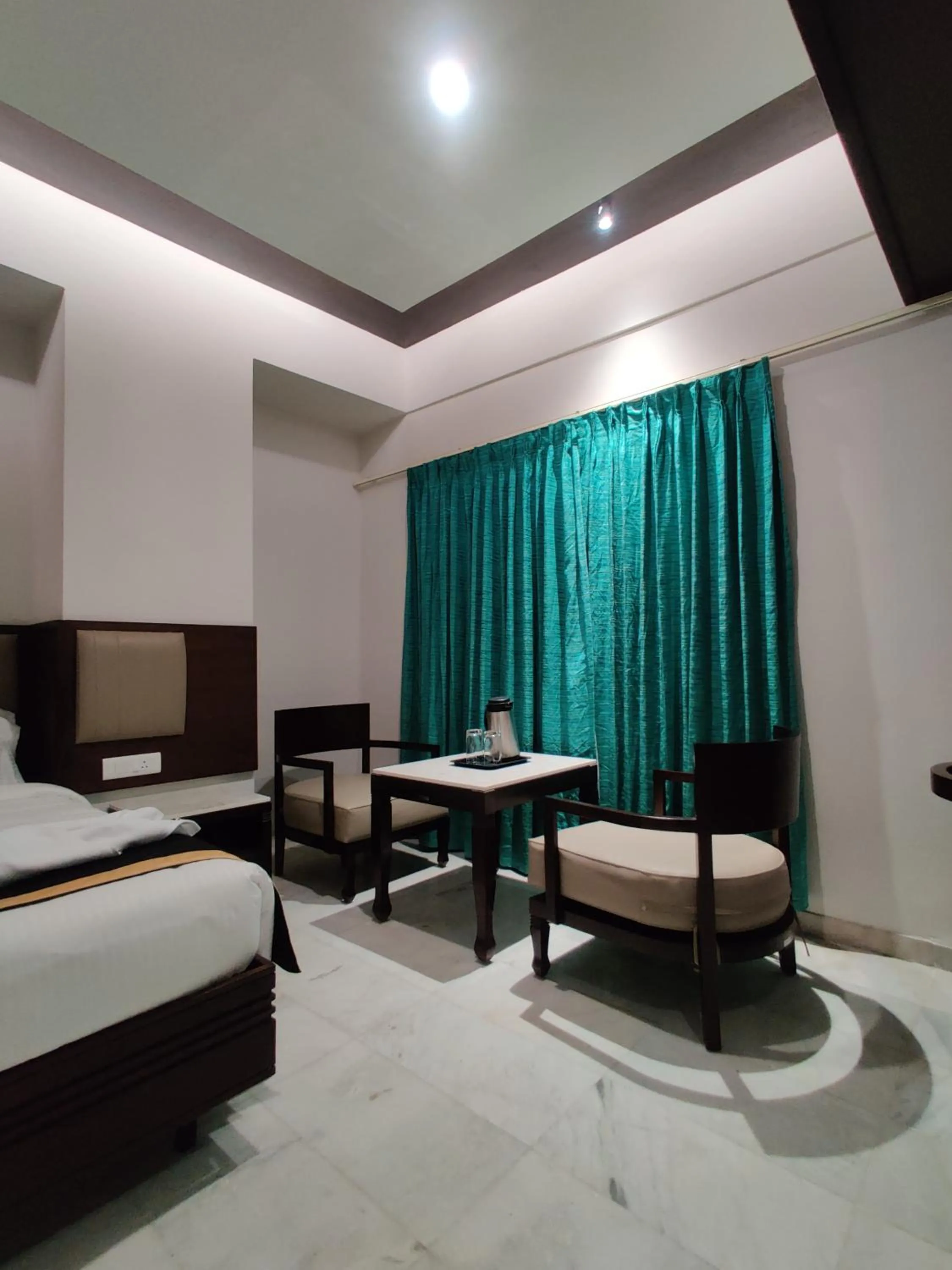 Bed in Hotel Saratharajans