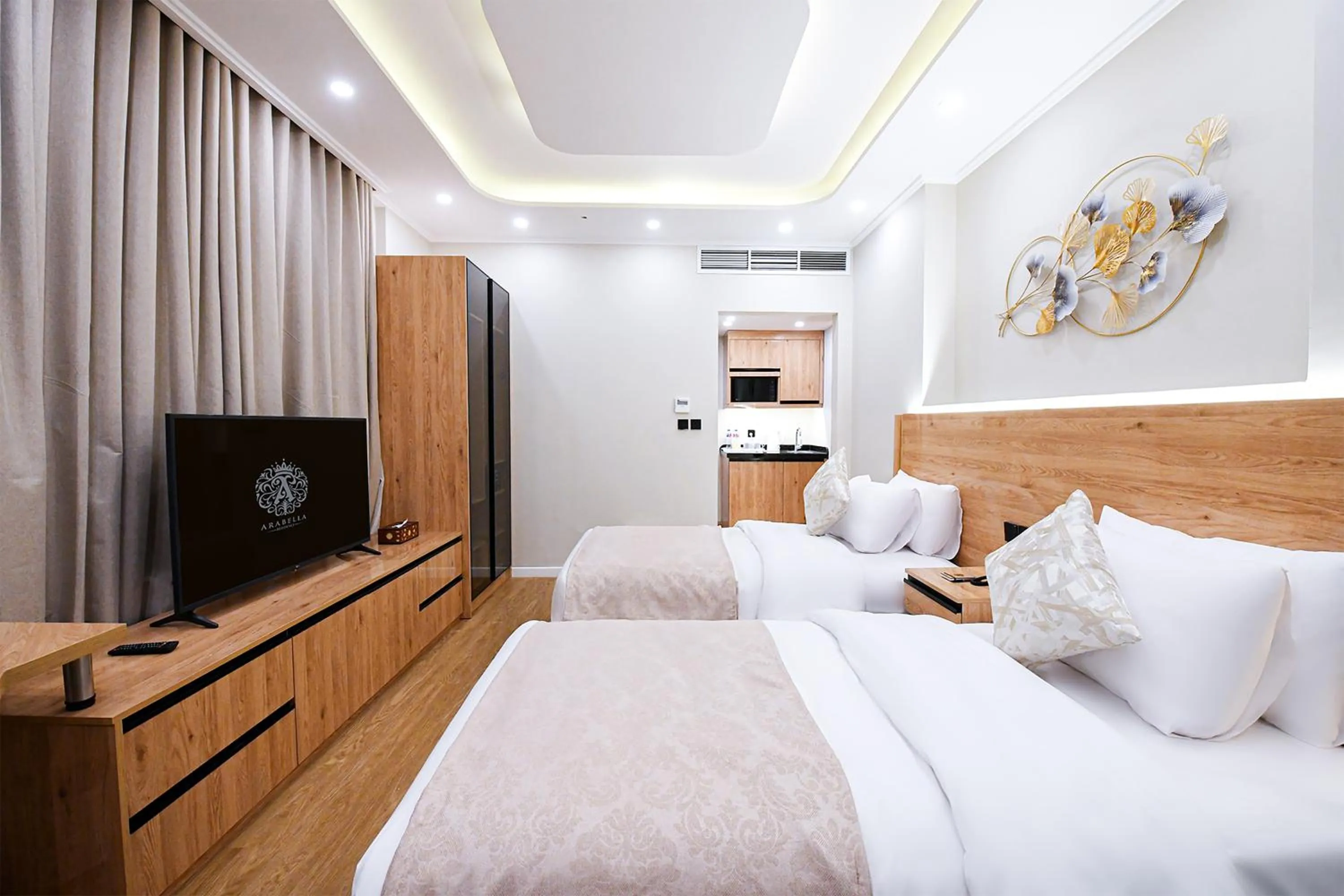 Communal lounge/ TV room, Bed in Arabella Premium Residence - New Cairo