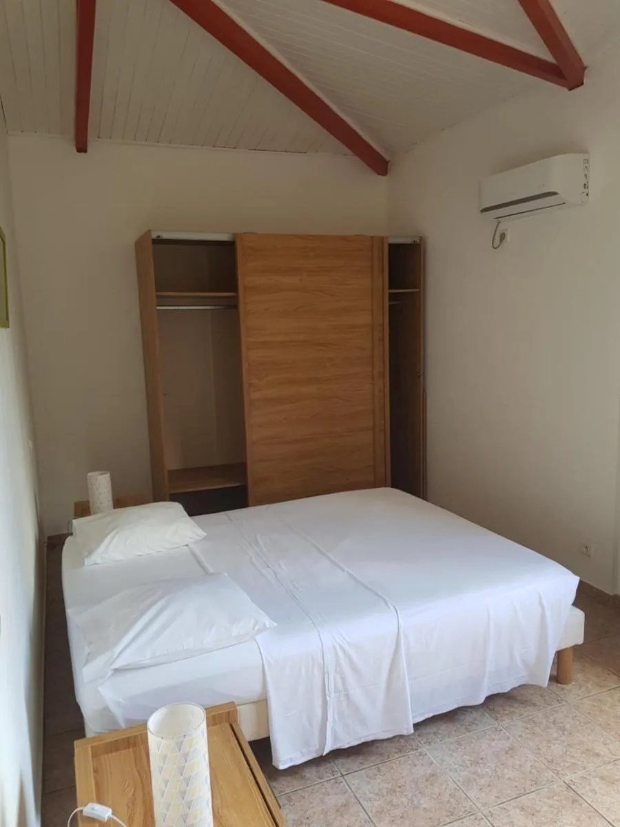 Bed in Hotel La Chaumiere