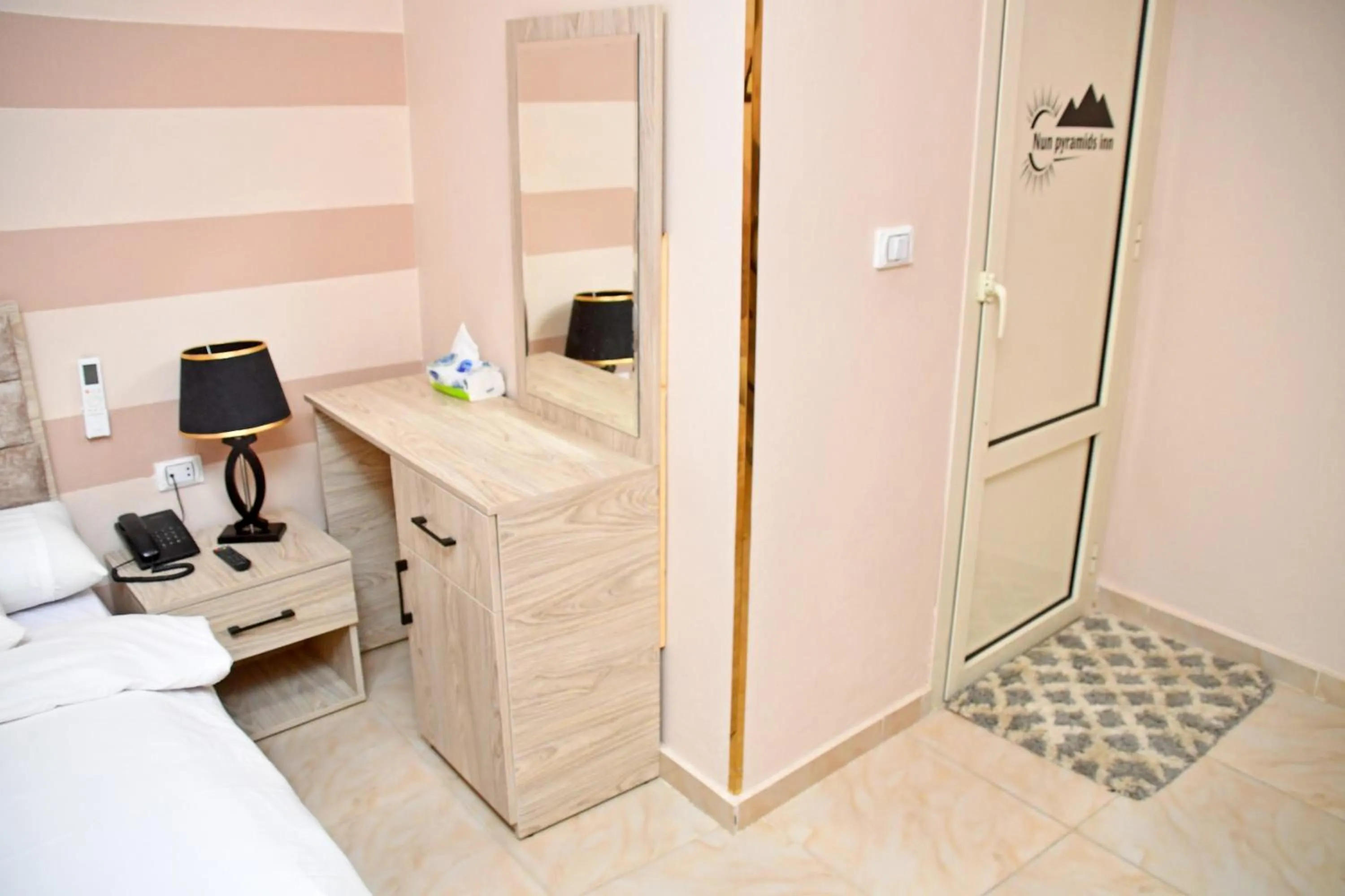 Bedroom in Nun Pyramids INN