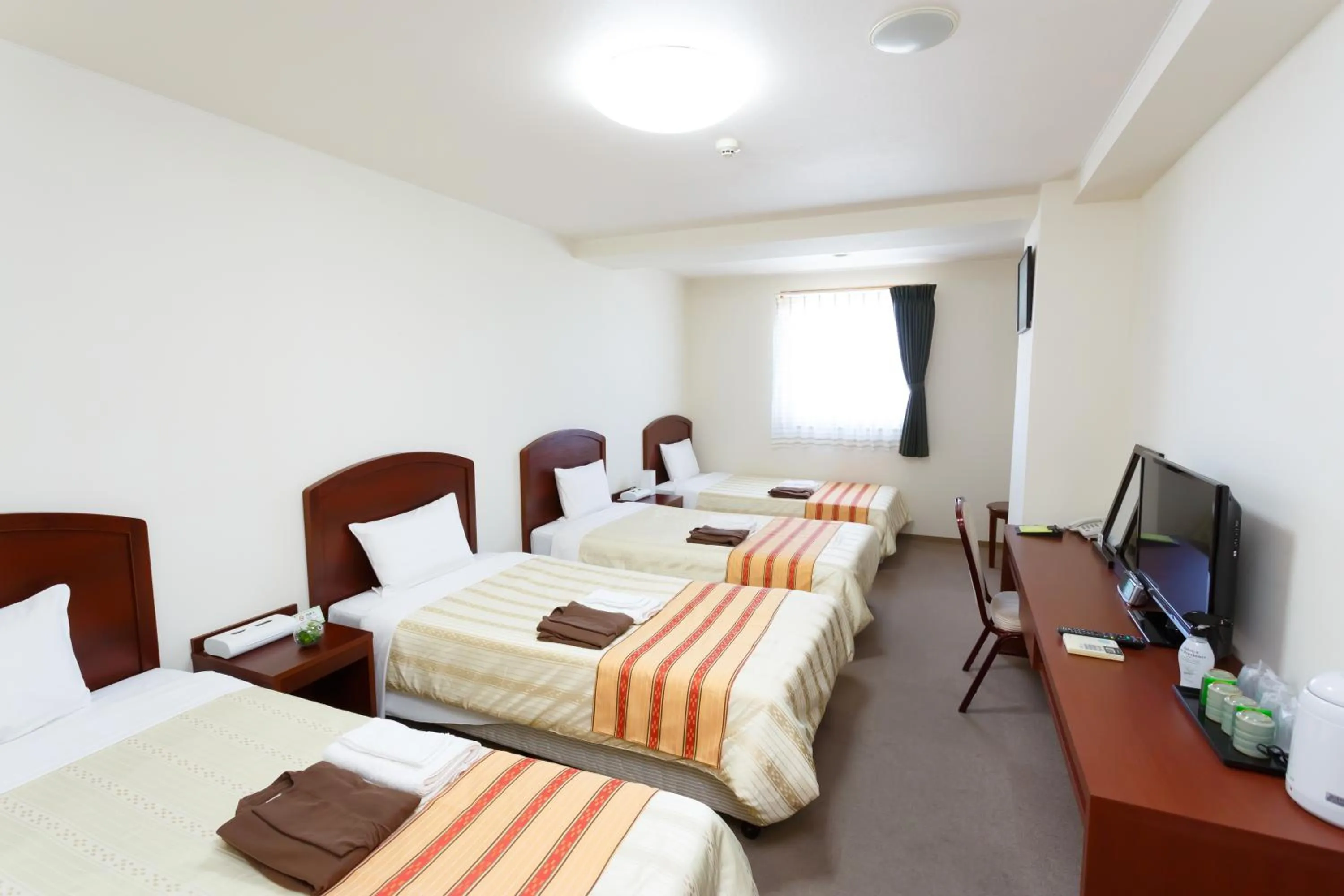 Photo of the whole room, Bed in Hotel Peace Island Miyakojima Shiyakusho Tori