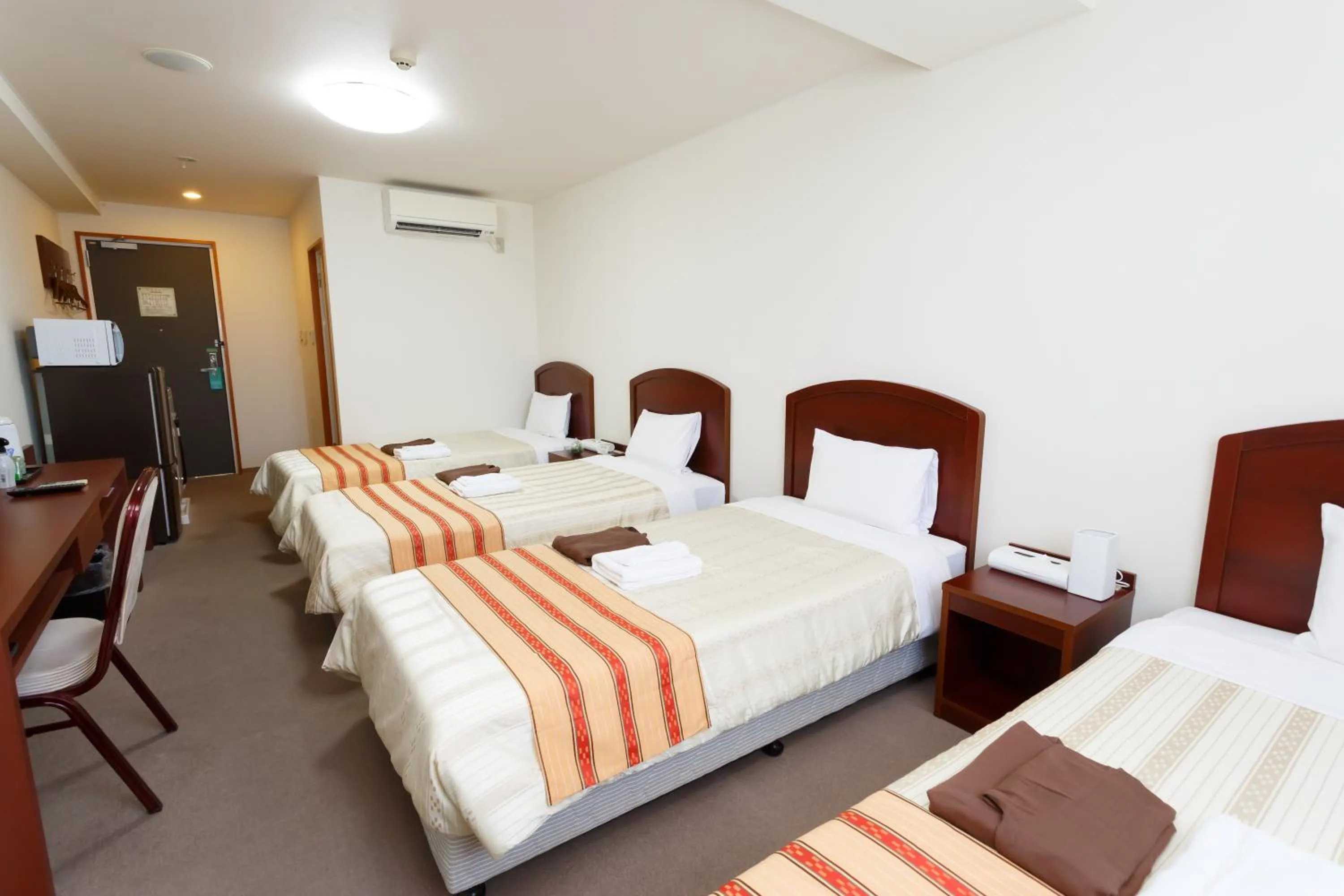 Photo of the whole room, Bed in Hotel Peace Island Miyakojima Shiyakusho Tori