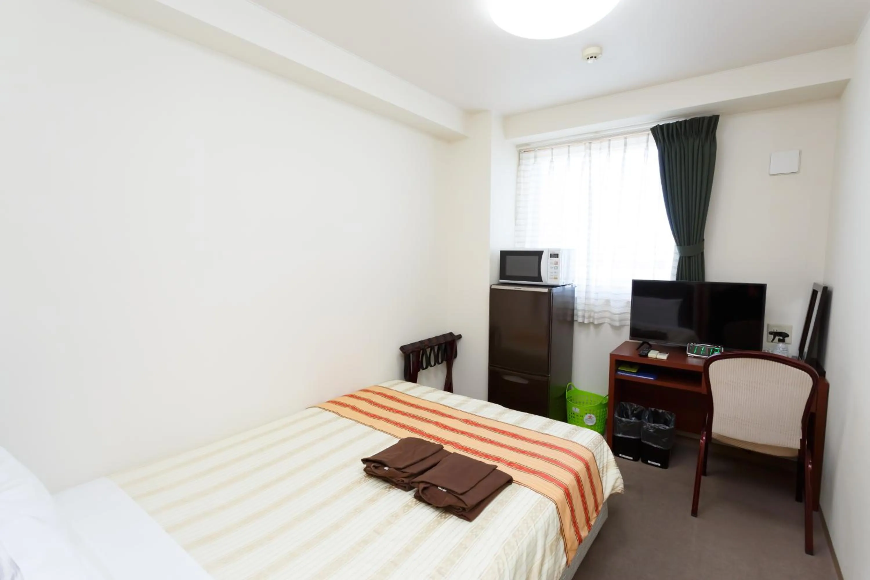 Photo of the whole room, Bed in Hotel Peace Island Miyakojima Shiyakusho Tori