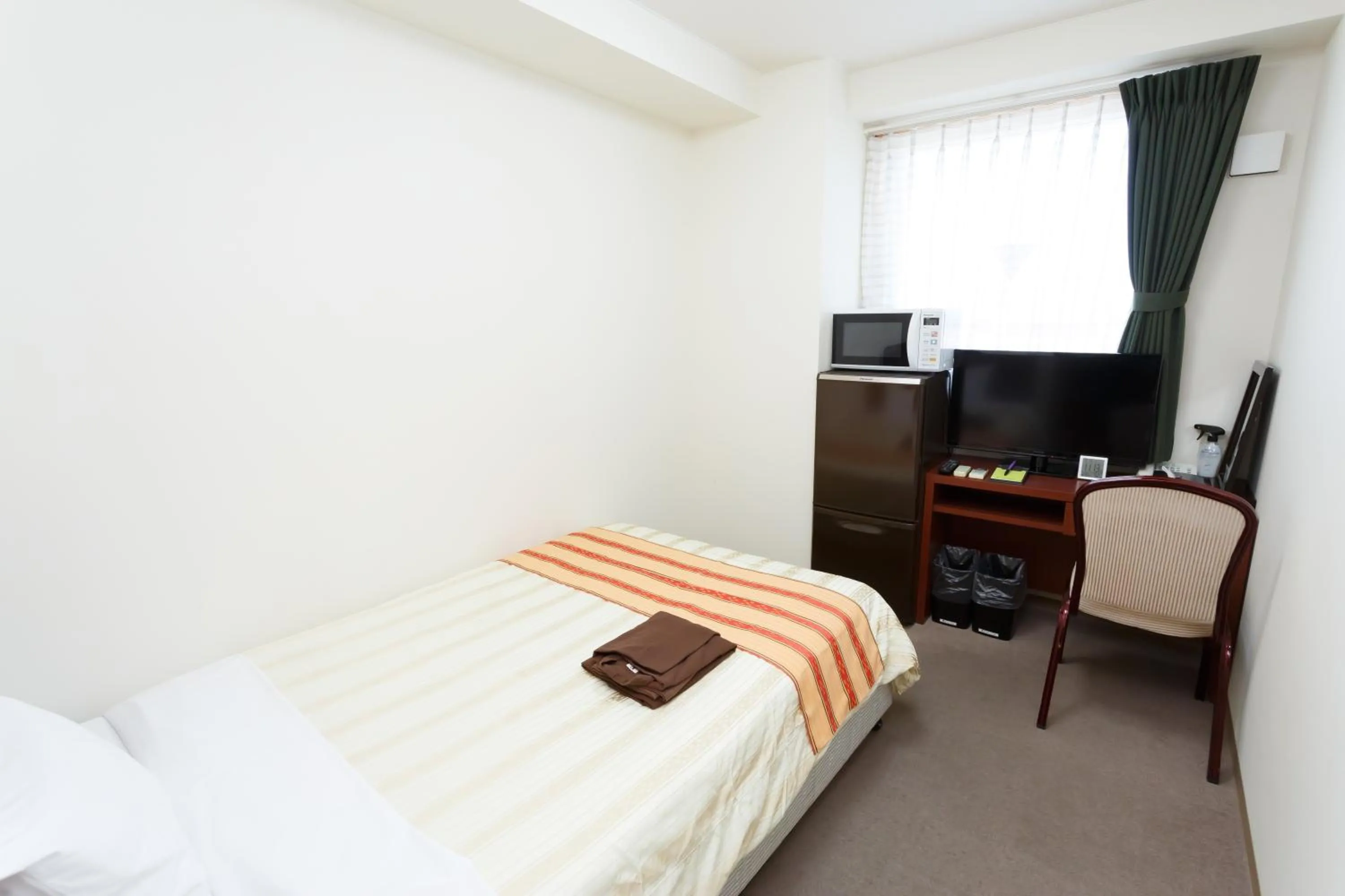 Photo of the whole room, Bed in Hotel Peace Island Miyakojima Shiyakusho Tori