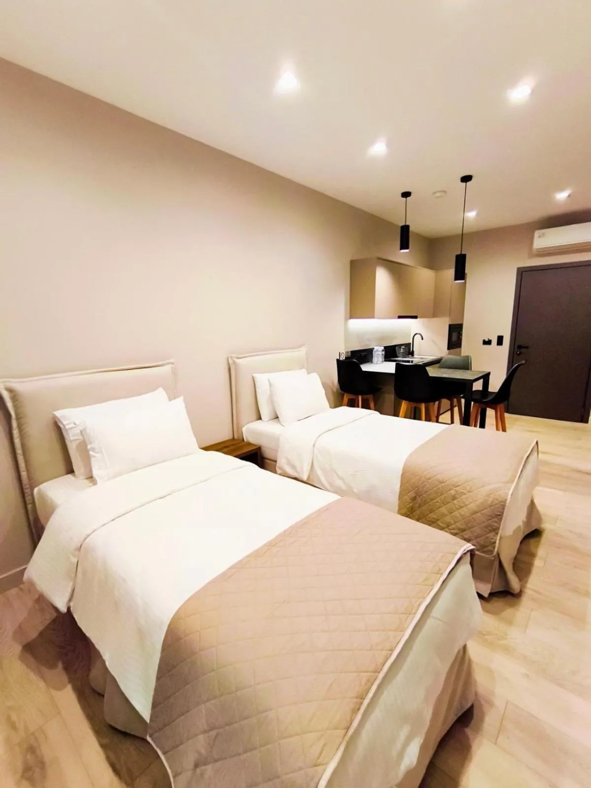 Bed in D Suites & Rooms