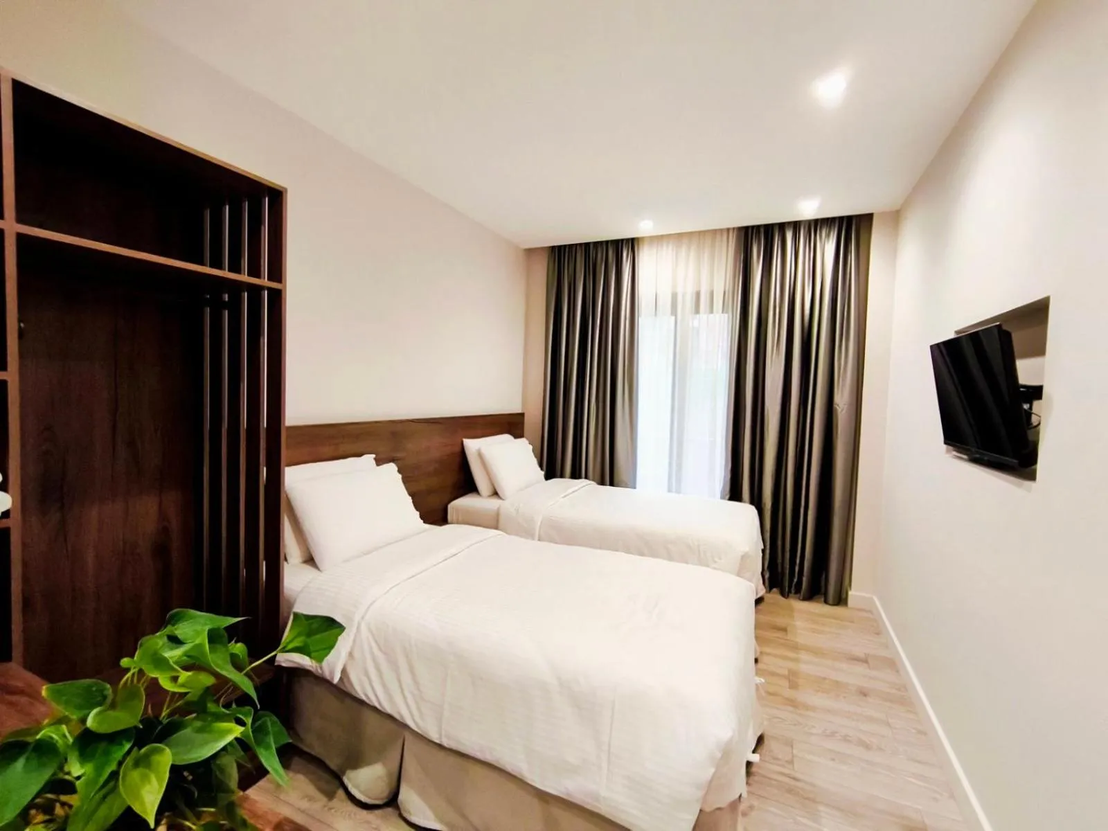 Bed in D Suites & Rooms