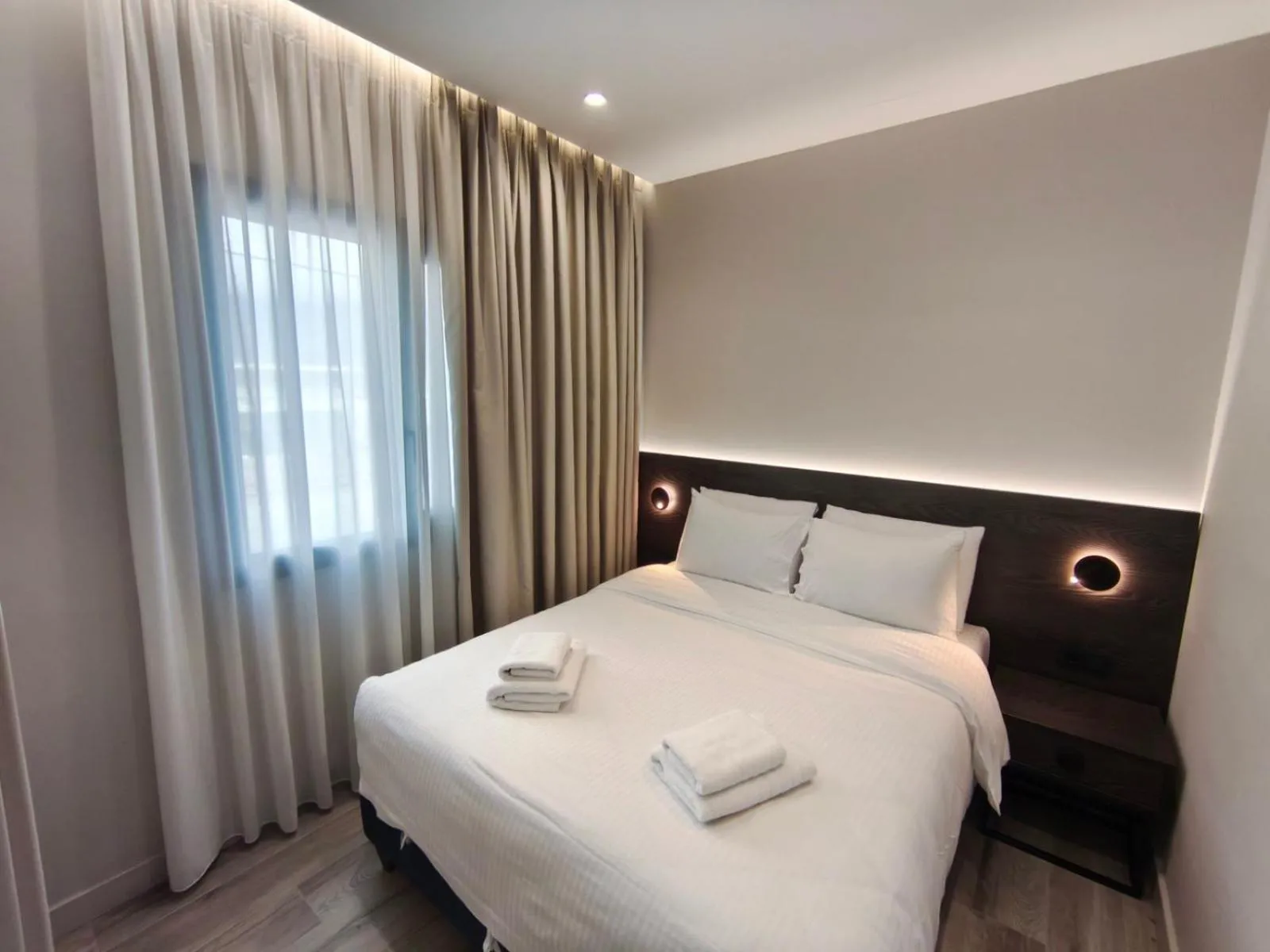 Bed in D Suites & Rooms