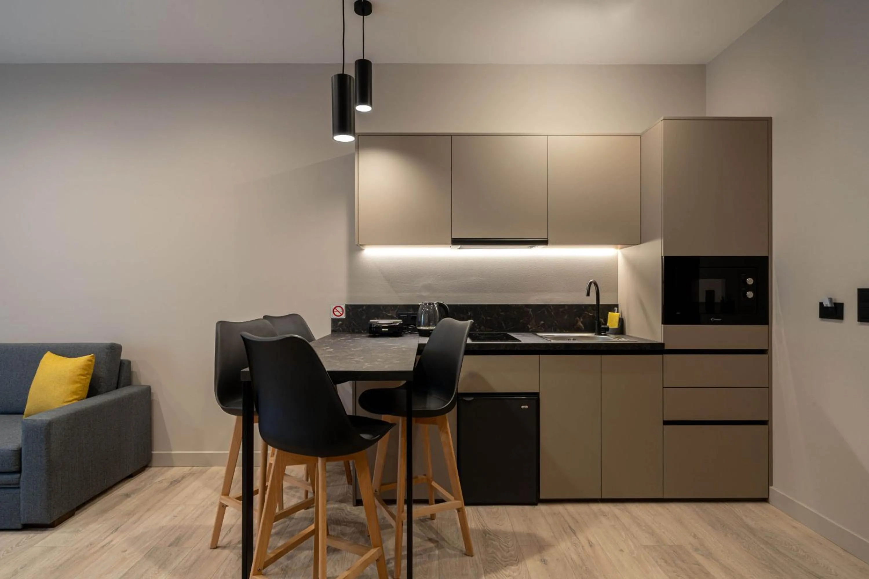 Kitchen or kitchenette in D Suites & Rooms